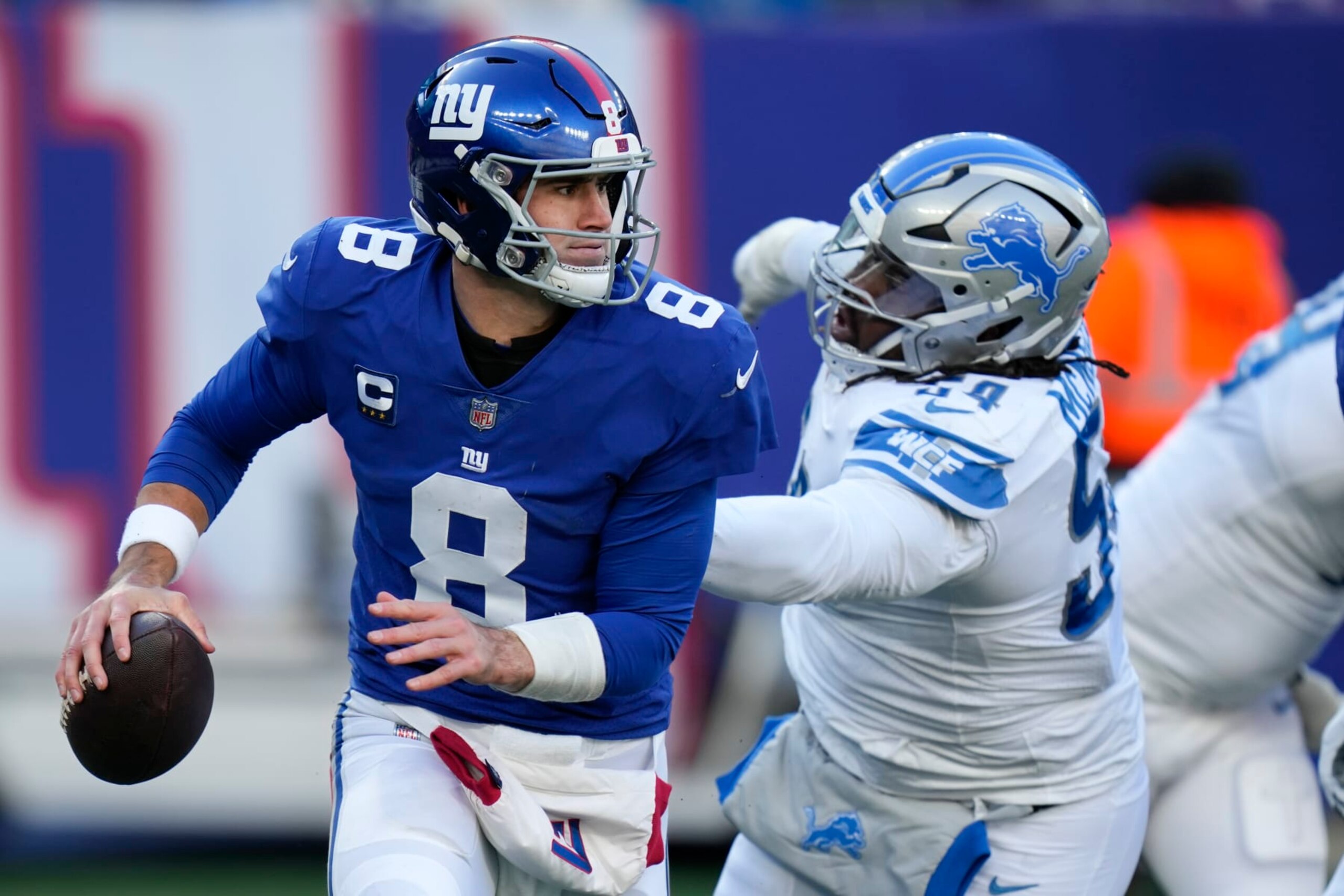 New York Giants quarterback Daniel Jones (8) looks to pass during the first half of an NFL football game against the Detroit Lions, Sunday, Nov. 20, 2022, in East Rutherford, N.J. (AP Photo/Seth Wenig) New York Giants quarterback Daniel Jones (8) looks to pass during the first half of an NFL football game against the Detroit Lions, Sunday, Nov. 20, 2022, in East Rutherford, N.J. (AP Photo/Seth Wenig)