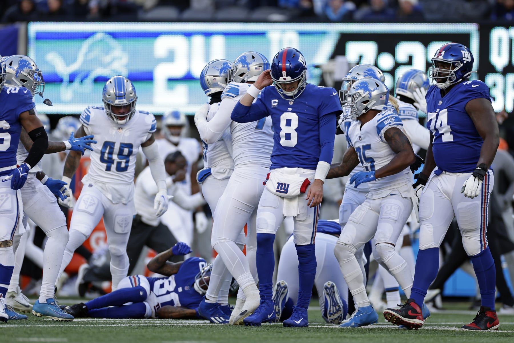 New York Giants quarterback Daniel Jones (8) reacts after throwing an interception against the Detroit Lions during an NFL football game Sunday, Nov. 20, 2022, in East Rutherford, N.J. (AP Photo/Adam Hunger)