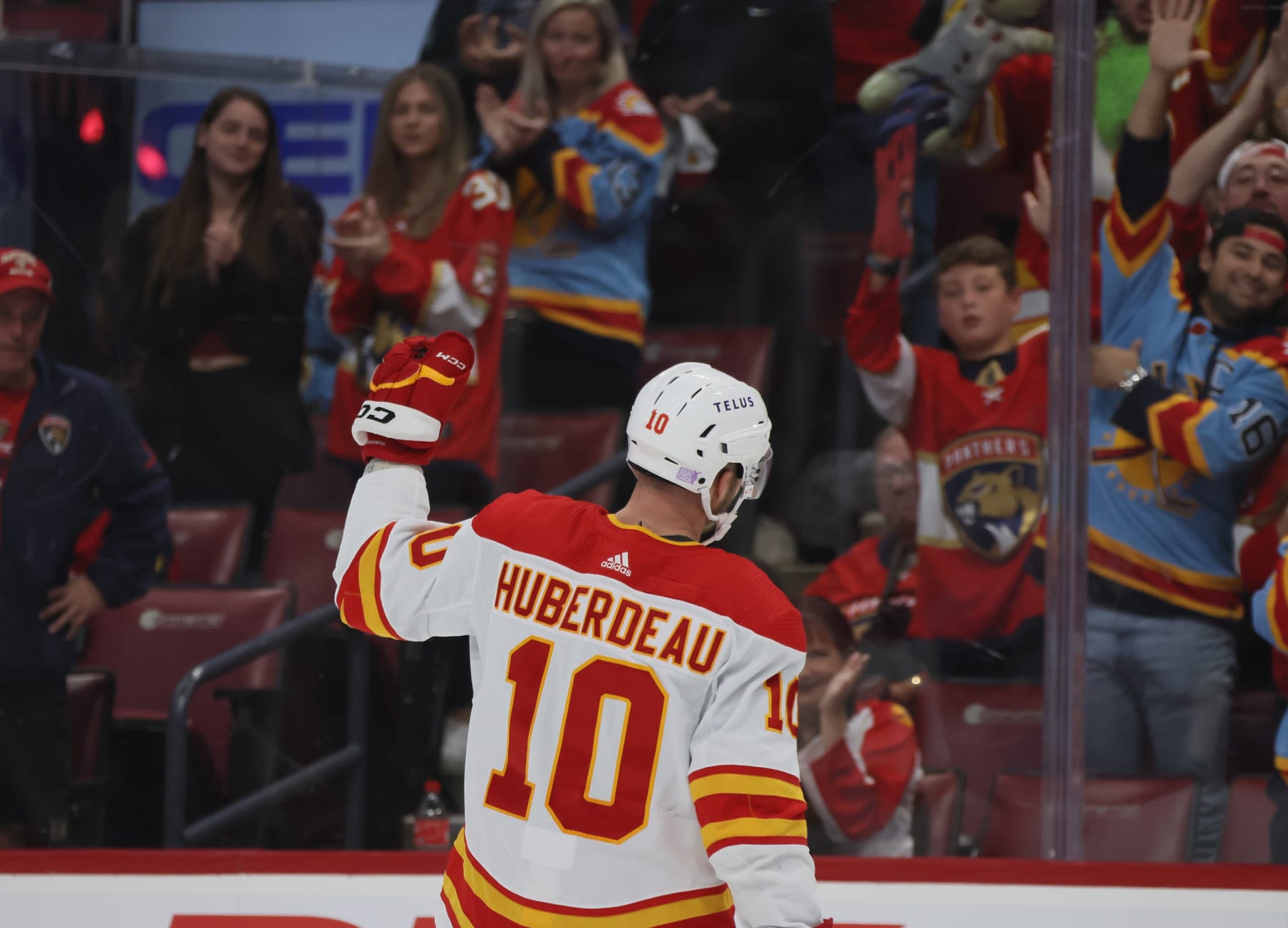 SUNRISE, FLORIDA - NOVEMBER 19: Jonathan Huberdeau #10 of the Calgary Flames acknowledges the fans applause during the first period against the Florida Panthers at FLA Live Arena on November 19, 2022 in Sunrise, Florida. (Photo by Bruce Bennett/Getty Images)