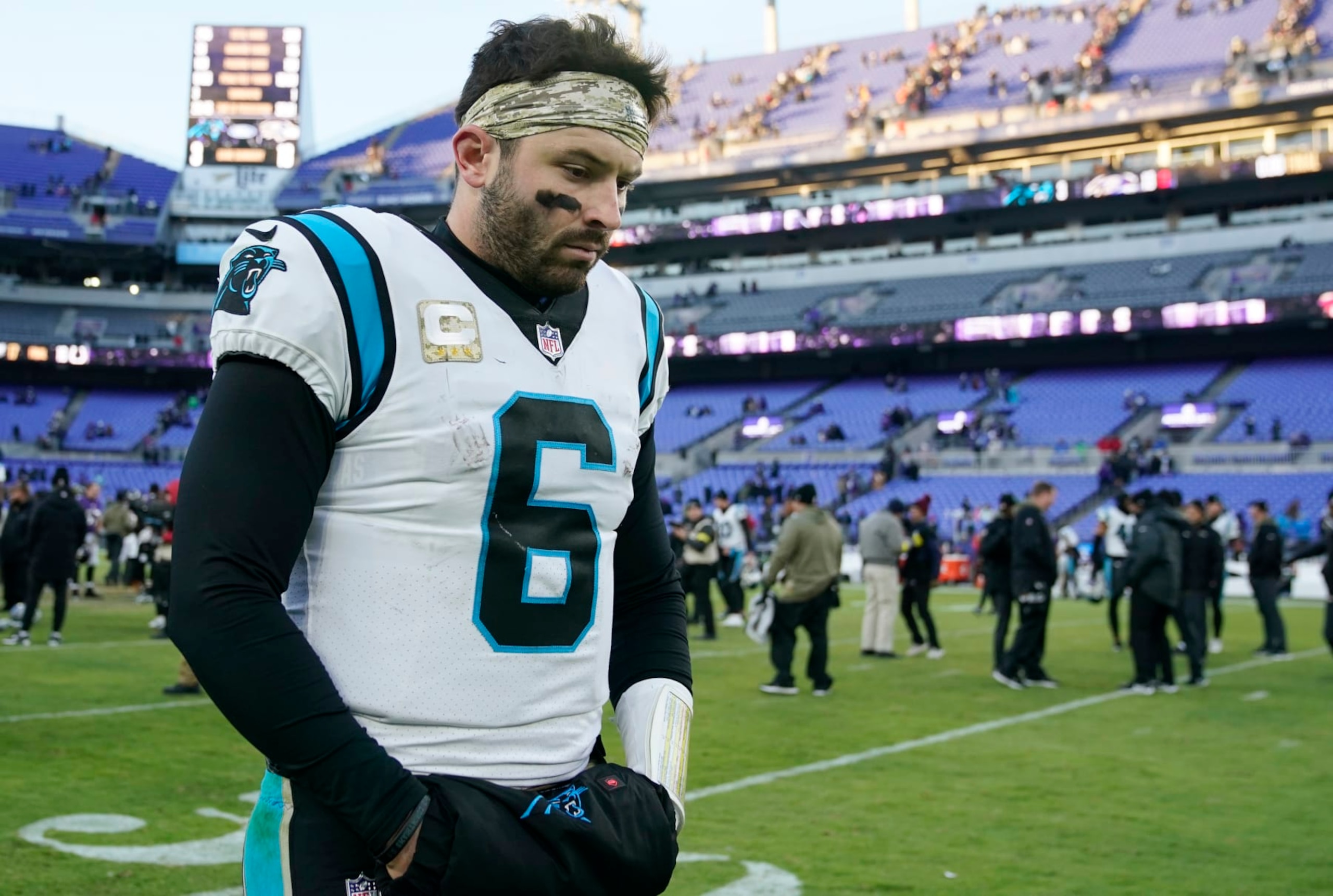 Carolina Panthers quarterback Baker Mayfield (6) walks off the field after his teams loss to the Baltimore Ravens after an NFL football game Sunday, Nov. 20, 2022, in Baltimore. (AP Photo/Patrick Semansky) Carolina Panthers quarterback Baker Mayfield (6) walks off the field after his teams loss to the Baltimore Ravens after an NFL football game Sunday, Nov. 20, 2022, in Baltimore. (AP Photo/Patrick Semansky)