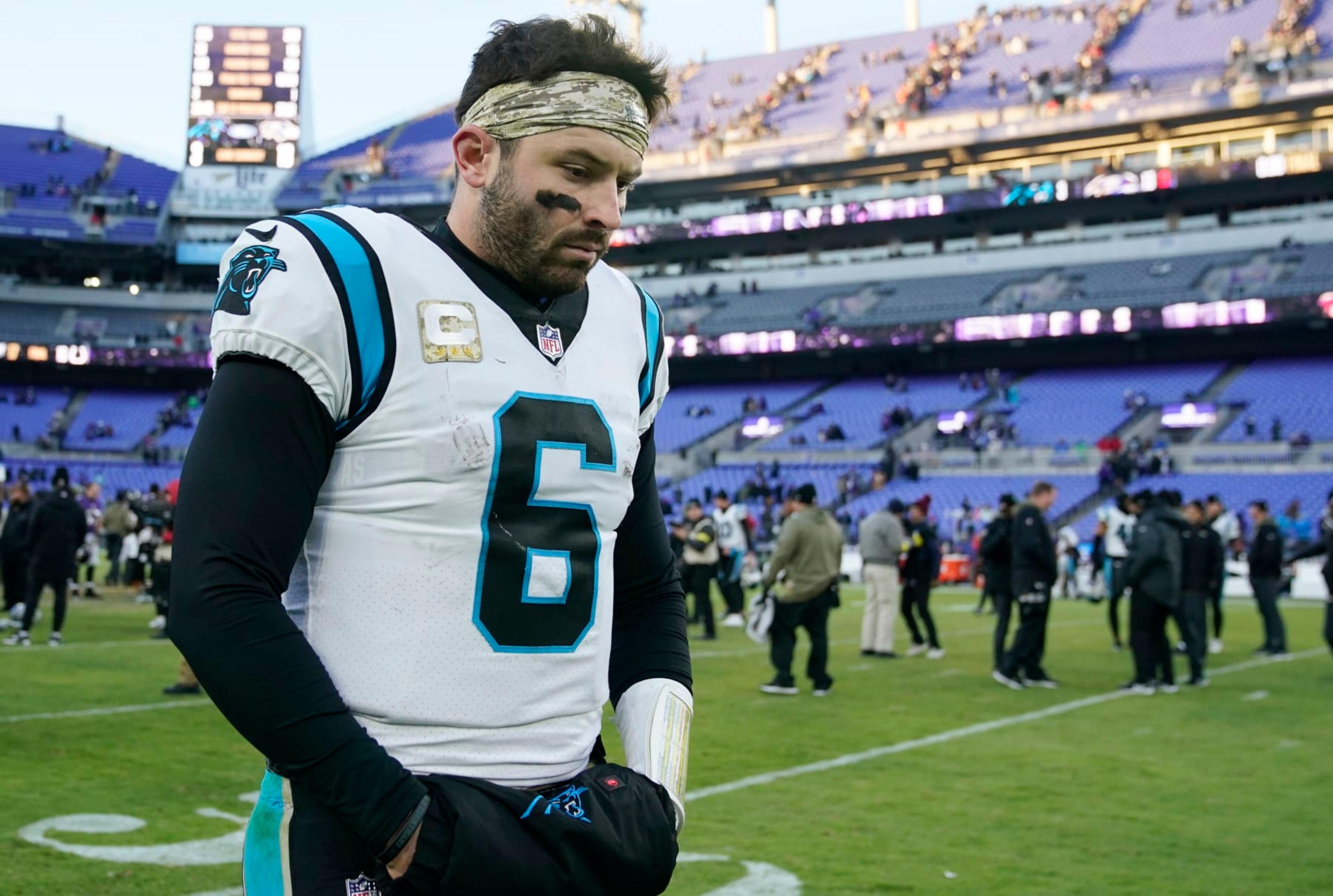 Carolina Panthers quarterback Baker Mayfield (6) walks off the field after his teams loss to the Baltimore Ravens after an NFL football game Sunday, Nov. 20, 2022, in Baltimore. (AP Photo/Patrick Semansky) Carolina Panthers quarterback Baker Mayfield (6) walks off the field after his teams loss to the Baltimore Ravens after an NFL football game Sunday, Nov. 20, 2022, in Baltimore. (AP Photo/Patrick Semansky)