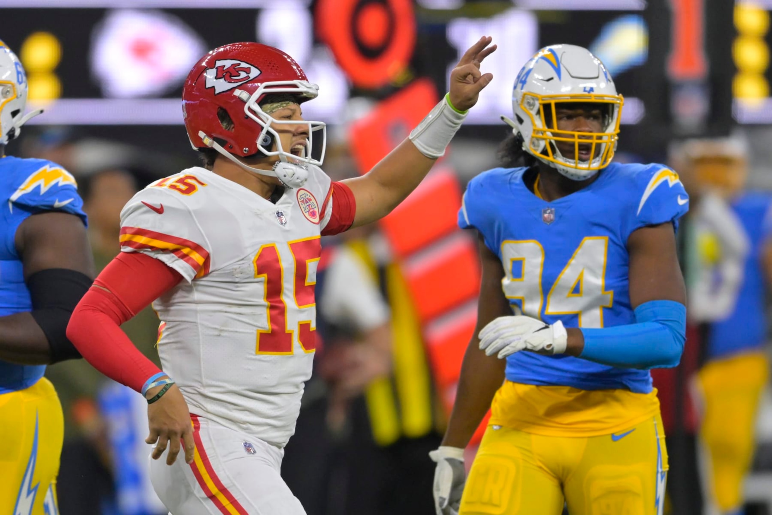 Kansas City Chiefs quarterback Patrick Mahomes, left, celebrates after running for a first down as Los Angeles Chargers linebacker Chris Rumph II stands in the background during the second half of an NFL football game Sunday, Nov. 20, 2022, in Inglewood, Calif. (AP Photo/Jayne Kamin-Oncea) Kansas City Chiefs quarterback Patrick Mahomes, left, celebrates after running for a first down as Los Angeles Chargers linebacker Chris Rumph II stands in the background during the second half of an NFL football game Sunday, Nov. 20, 2022, in Inglewood, Calif. (AP Photo/Jayne Kamin-Oncea)