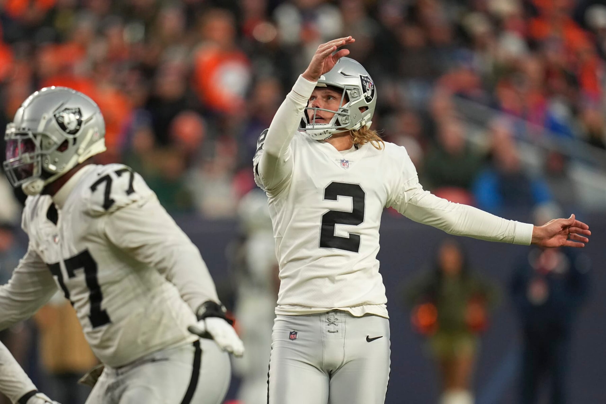Las Vegas Raiders place kicker Daniel Carlson (2) watches his field goal during the second half of an NFL football game against the Denver Broncos in Denver, Sunday, Nov. 20, 2022. (AP Photo/Jack Dempsey) Las Vegas Raiders place kicker Daniel Carlson (2) watches his field goal during the second half of an NFL football game against the Denver Broncos in Denver, Sunday, Nov. 20, 2022. (AP Photo/Jack Dempsey)