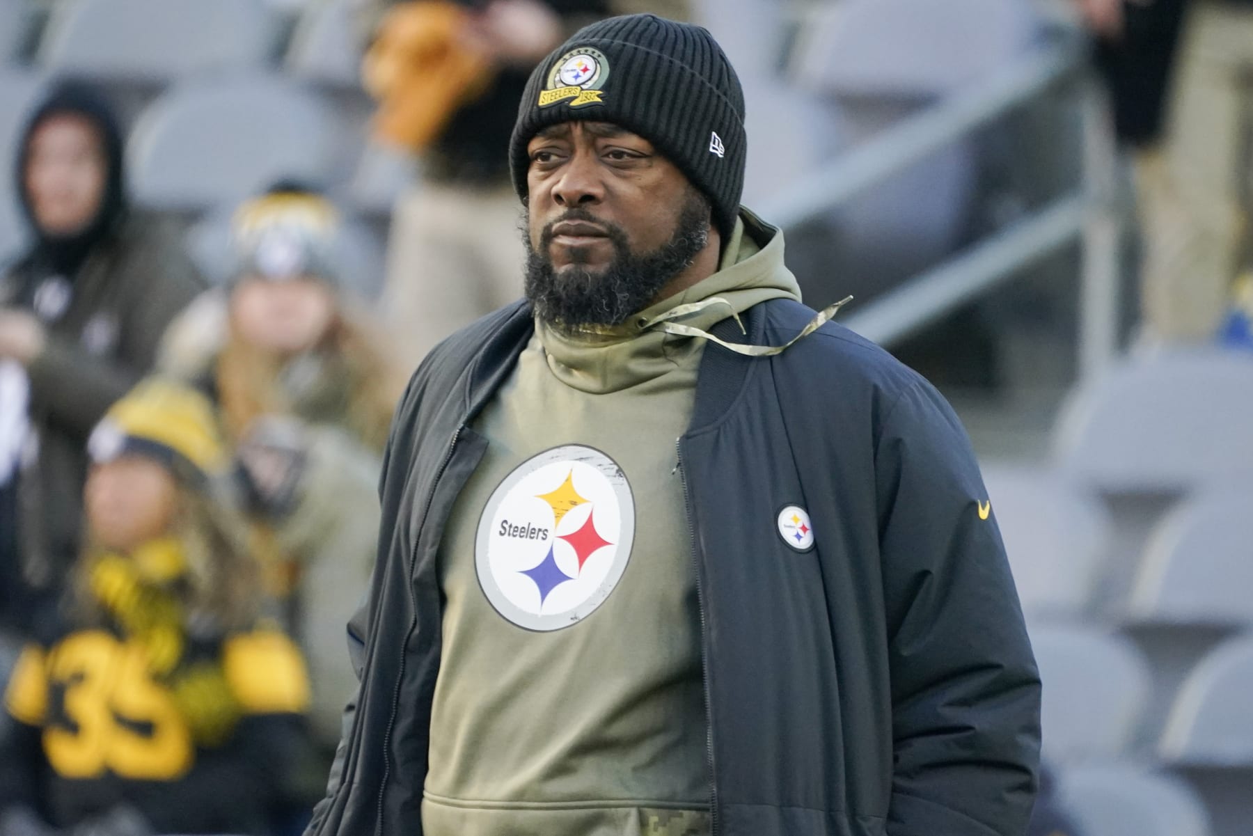 Pittsburgh Steelers head coach Mike Tomlin walks on the field during warmups before an NFL football game against the Cincinnati Bengals, Sunday, Nov. 20, 2022, in Pittsburgh. (AP Photo/Gene J. Puskar)