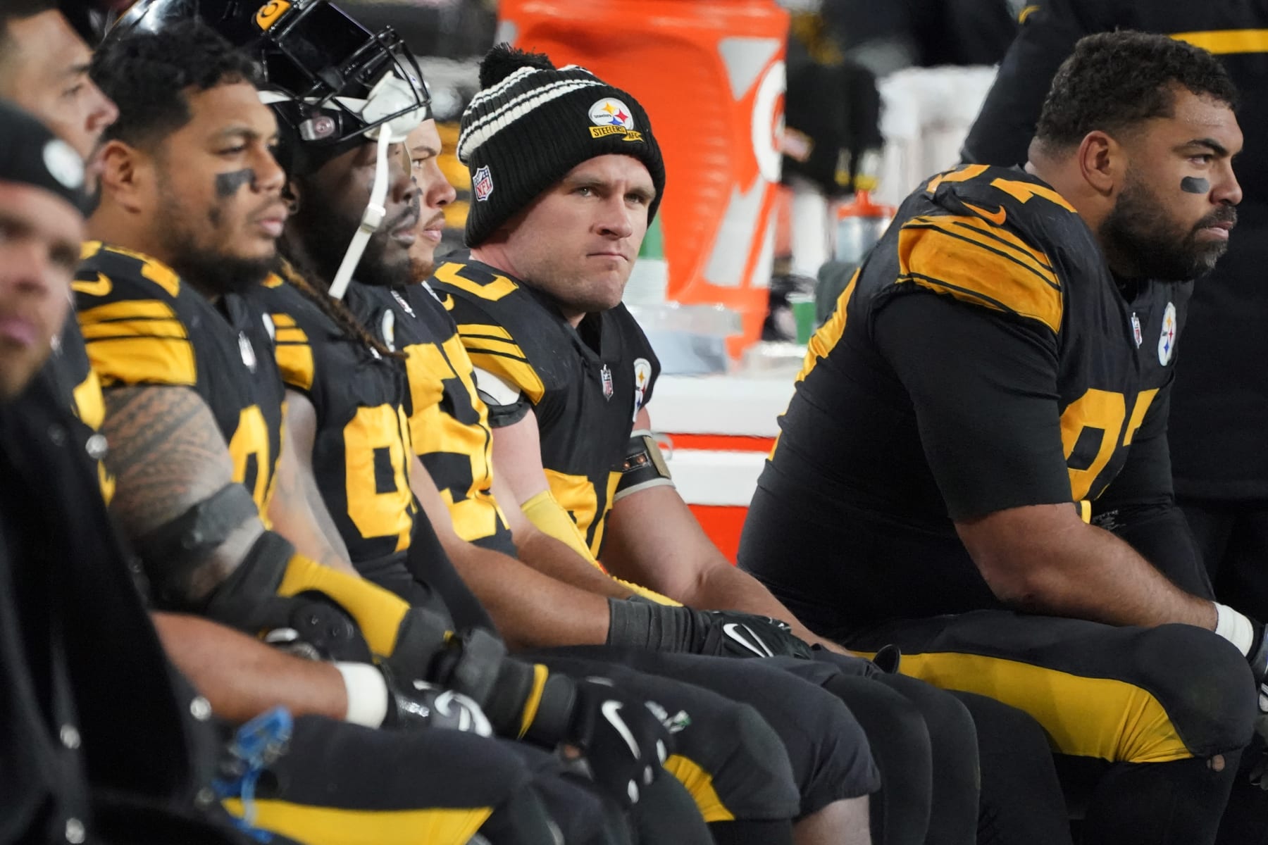 Pittsburgh Steelers linebacker T.J. Watt, center, and defensive tackle Cameron Heyward, right, sit on the bench late in the second half of an NFL football game against the Cincinnati Bengals in Pittsburgh, Sunday, Nov. 20, 2022. The Bengals won 37-30. (AP Photo/Gene J. Puskar)