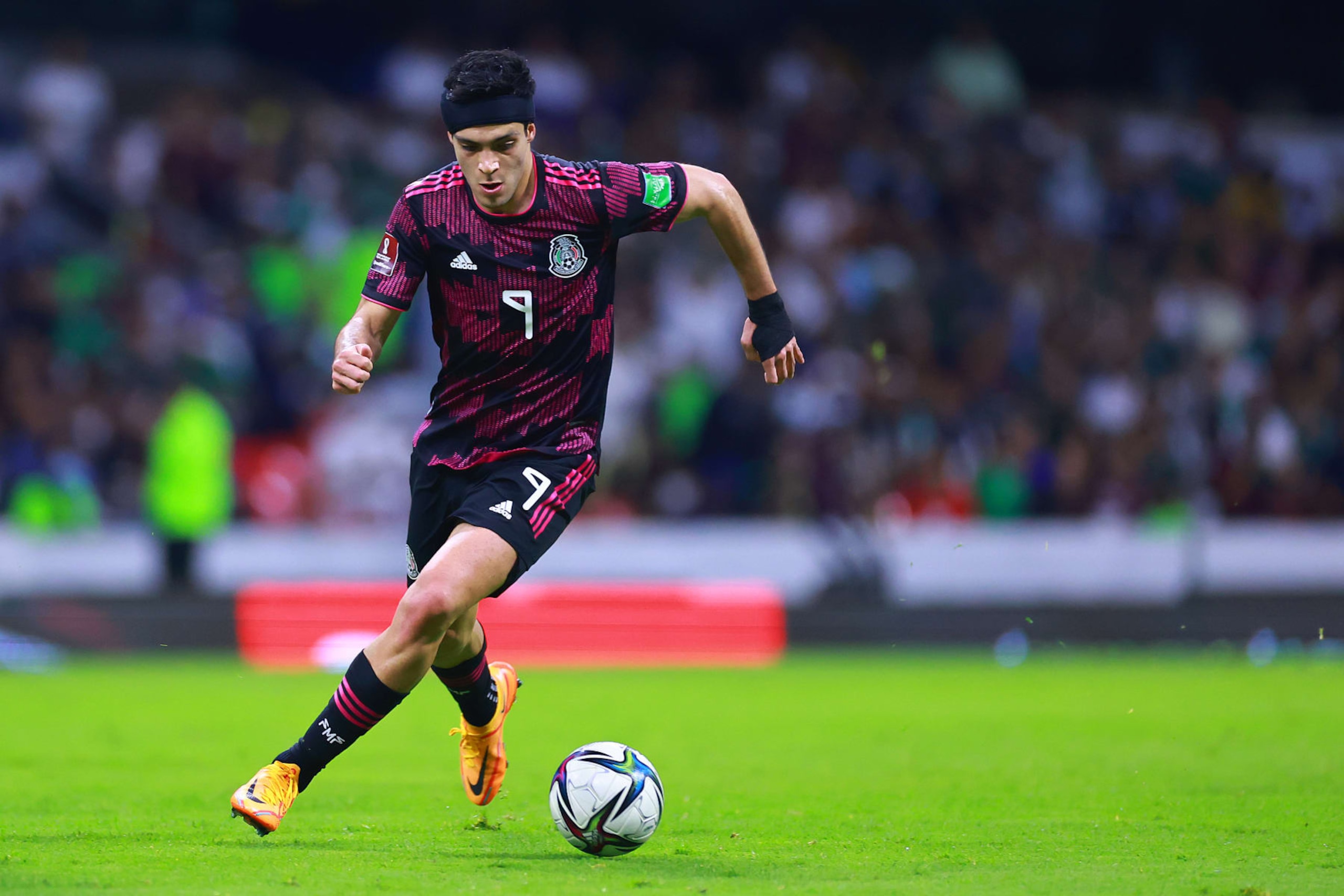 MEXICO CITY, MEXICO - MARCH 30: Raul Jimenez of Mexico drives the ball during the match between Mexico and El Salvador as part of the Concacaf 2022 FIFA World Cup Qualifiers at Azteca Stadium on March 30, 2022 in Mexico City, Mexico. (Photo by Hector Vivas/Getty Images)