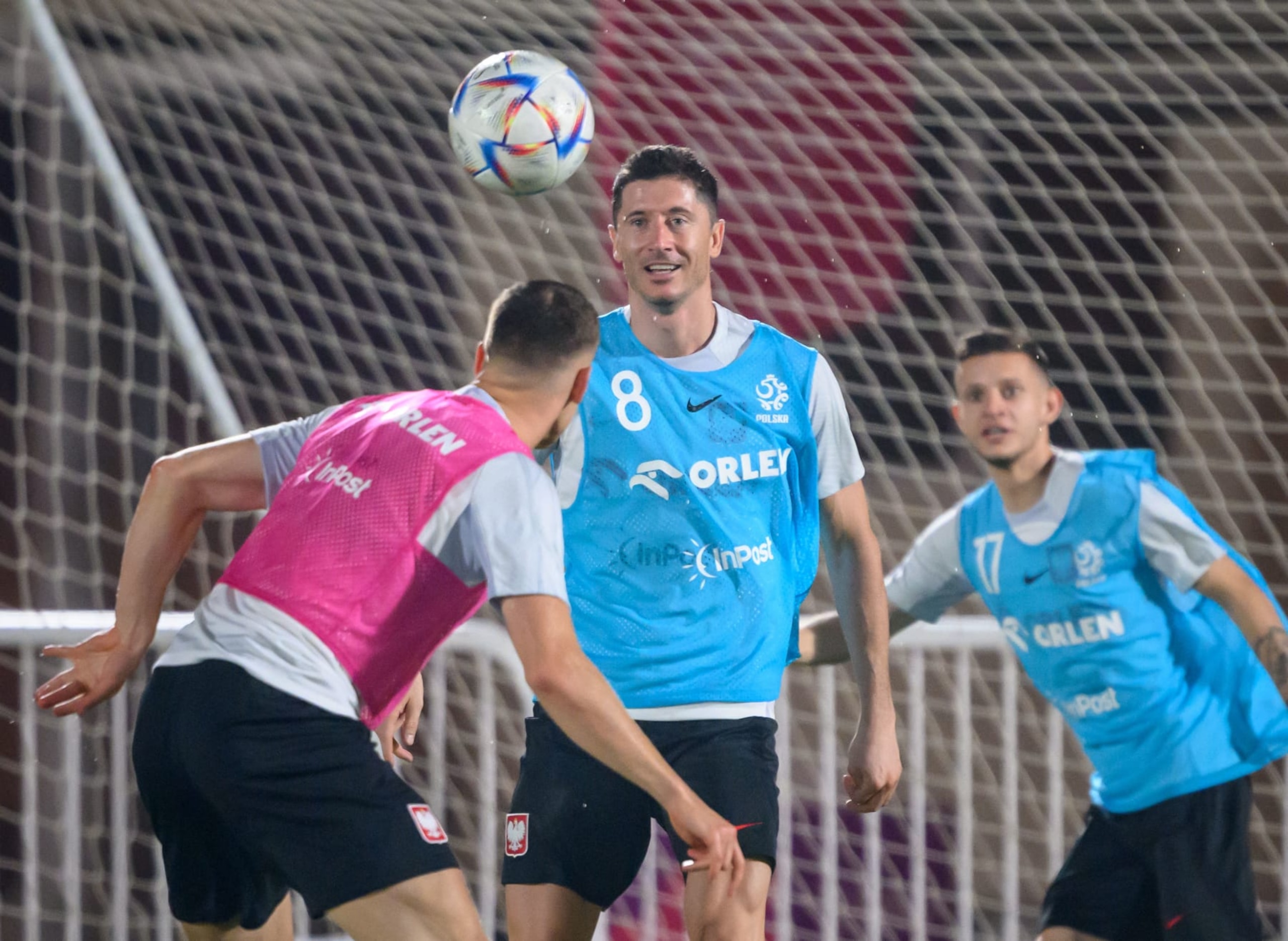 Poland's forward Robert Lewandowski (C) takes part in a  training session at the Al Kharaitiyat SC training grounds in Doha on November 19, 2022, ahead of the Qatar 2022 World Cup football tournament. (Photo by FABRICE COFFRINI / AFP) (Photo by FABRICE COFFRINI/AFP via Getty Images)
