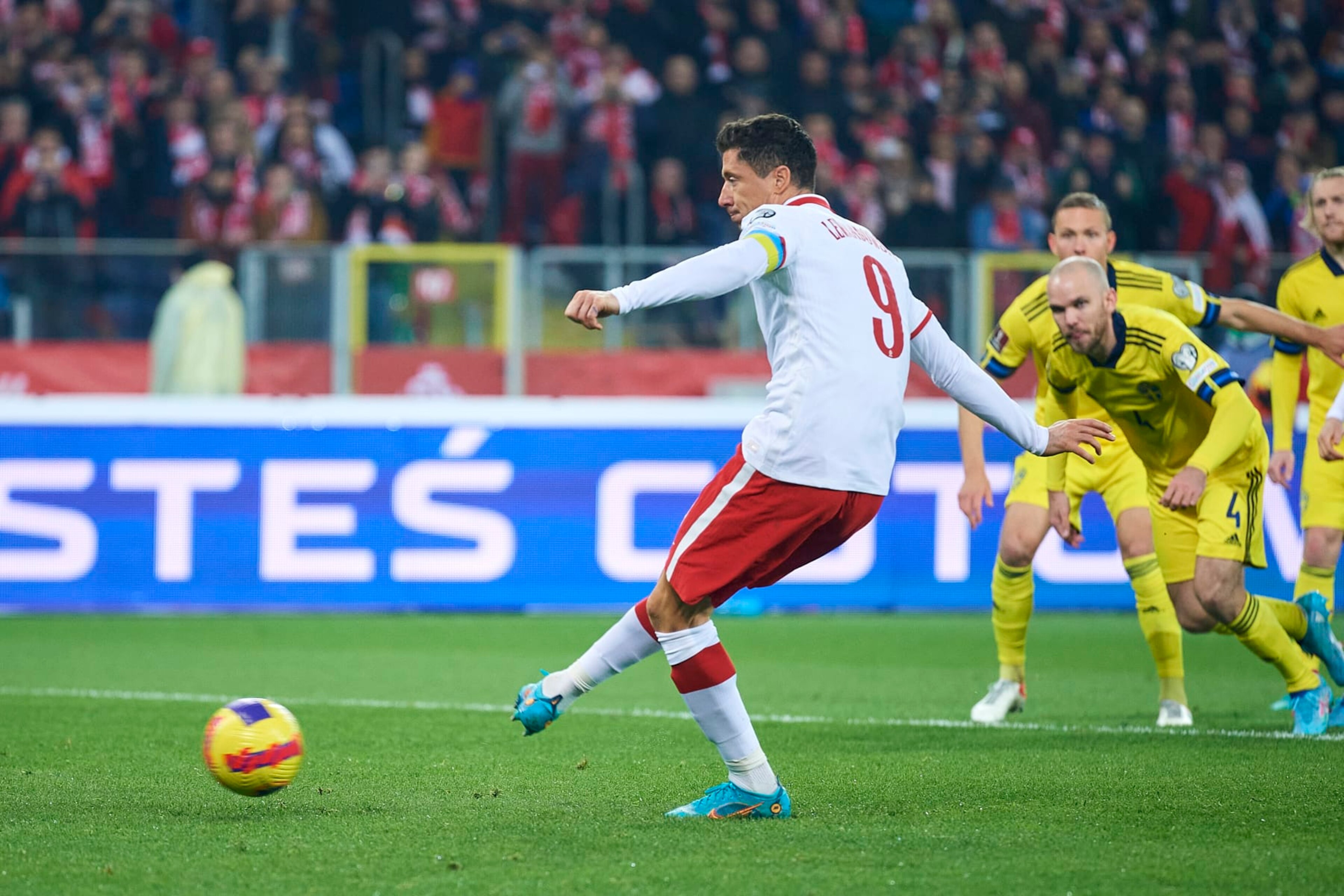CHORZOW, POLAND - MARCH 29: Robert Lewandowski from Poland shoots goal from penalty kick during the 2022 FIFA World Cup Qualifier knockout round play-off match between Poland and Sweden at Silesian Stadium on March 29, 2022 in Chorzow. (Photo by Adam Nurkiewicz/Getty Images) CHORZOW, POLAND - MARCH 29: Robert Lewandowski from Poland shoots goal from penalty kick during the 2022 FIFA World Cup Qualifier knockout round play-off match between Poland and Sweden at Silesian Stadium on March 29, 2022 in Chorzow. (Photo by Adam Nurkiewicz/Getty Images)