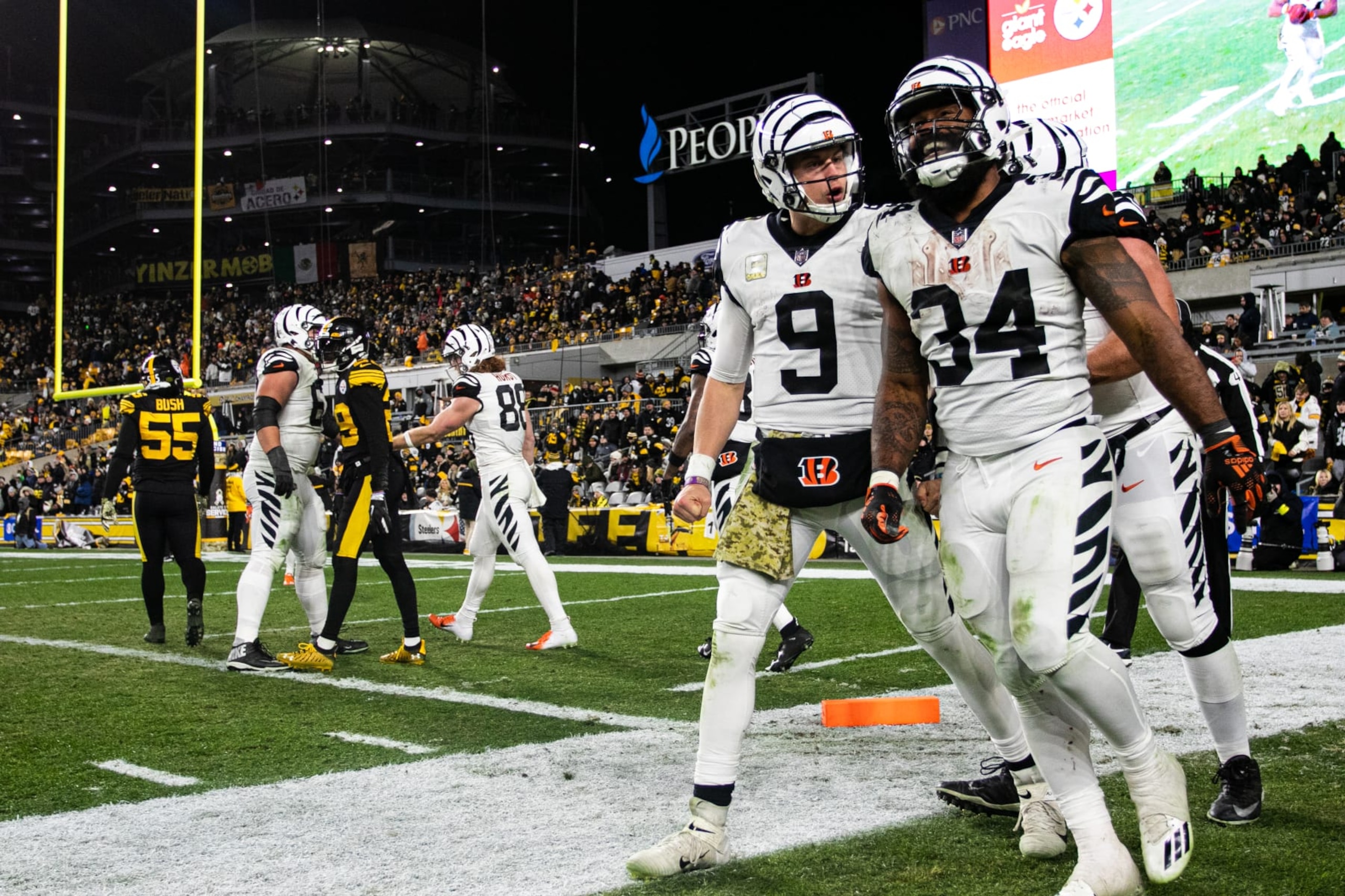 PITTSBURGH, PA - NOVEMBER 20: Cincinnati Bengals quarterback Joe Burrow (9) celebrates with Cincinnati Bengals running back Samaje Perine (34) after a touchdown during the national football league game between the Cincinnati Bengals and the Pittsburgh Steelers on November 20, 2022 at Acrisure Stadium in Pittsburgh, PA. (Photo by Mark Alberti/Icon Sportswire via Getty Images) PITTSBURGH, PA - NOVEMBER 20: Cincinnati Bengals quarterback Joe Burrow (9) celebrates with Cincinnati Bengals running back Samaje Perine (34) after a touchdown during the national football league game between the Cincinnati Bengals and the Pittsburgh Steelers on November 20, 2022 at Acrisure Stadium in Pittsburgh, PA. (Photo by Mark Alberti/Icon Sportswire via Getty Images)