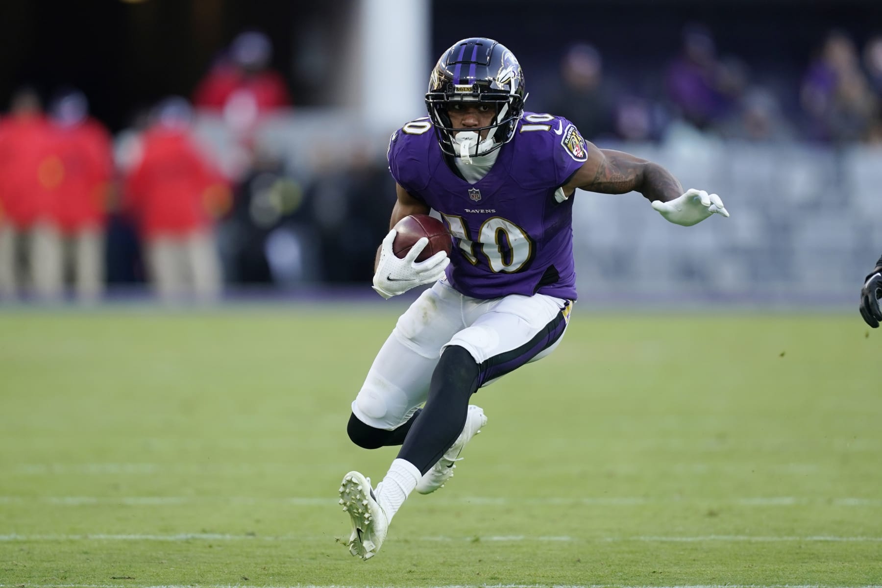 Baltimore Ravens wide receiver Demarcus Robinson (10) looks for running room in the second half of an NFL football game against the Carolina Panthers Sunday, Nov. 20, 2022, in Baltimore. (AP Photo/Patrick Semansky)