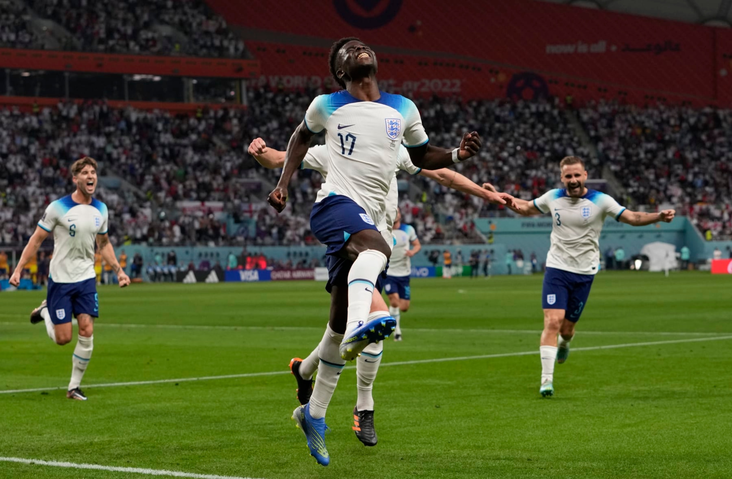 England's Bukayo Saka celebrates after scoring his side's second goal during the World Cup group B soccer match between England and Iran at the Khalifa International Stadium in Doha, Qatar, Monday, Nov. 21, 2022. (AP Photo/Alessandra Tarantino) England's Bukayo Saka celebrates after scoring his side's second goal during the World Cup group B soccer match between England and Iran at the Khalifa International Stadium in Doha, Qatar, Monday, Nov. 21, 2022. (AP Photo/Alessandra Tarantino)