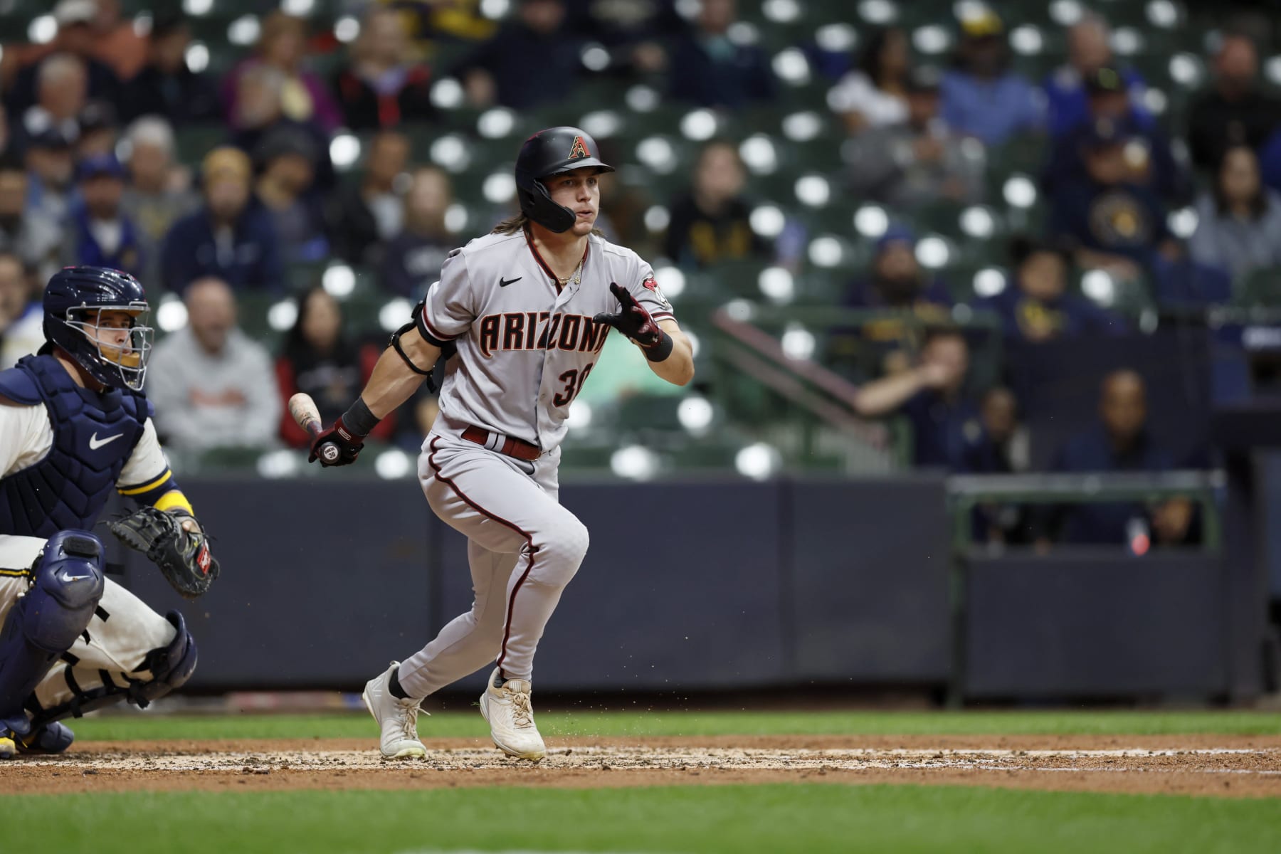 Baseball: Arizona Diamondbacks Jake McCarthy (30) in action, hitting and running to first base vs Milwaukee Brewers at American Family Field. 
Milwaukee, WI 10/3/2022 
CREDIT: David E. Klutho (Photo by David E. Klutho/Sports Illustrated via Getty Images) 
(Set Number: X164184 TK1)
