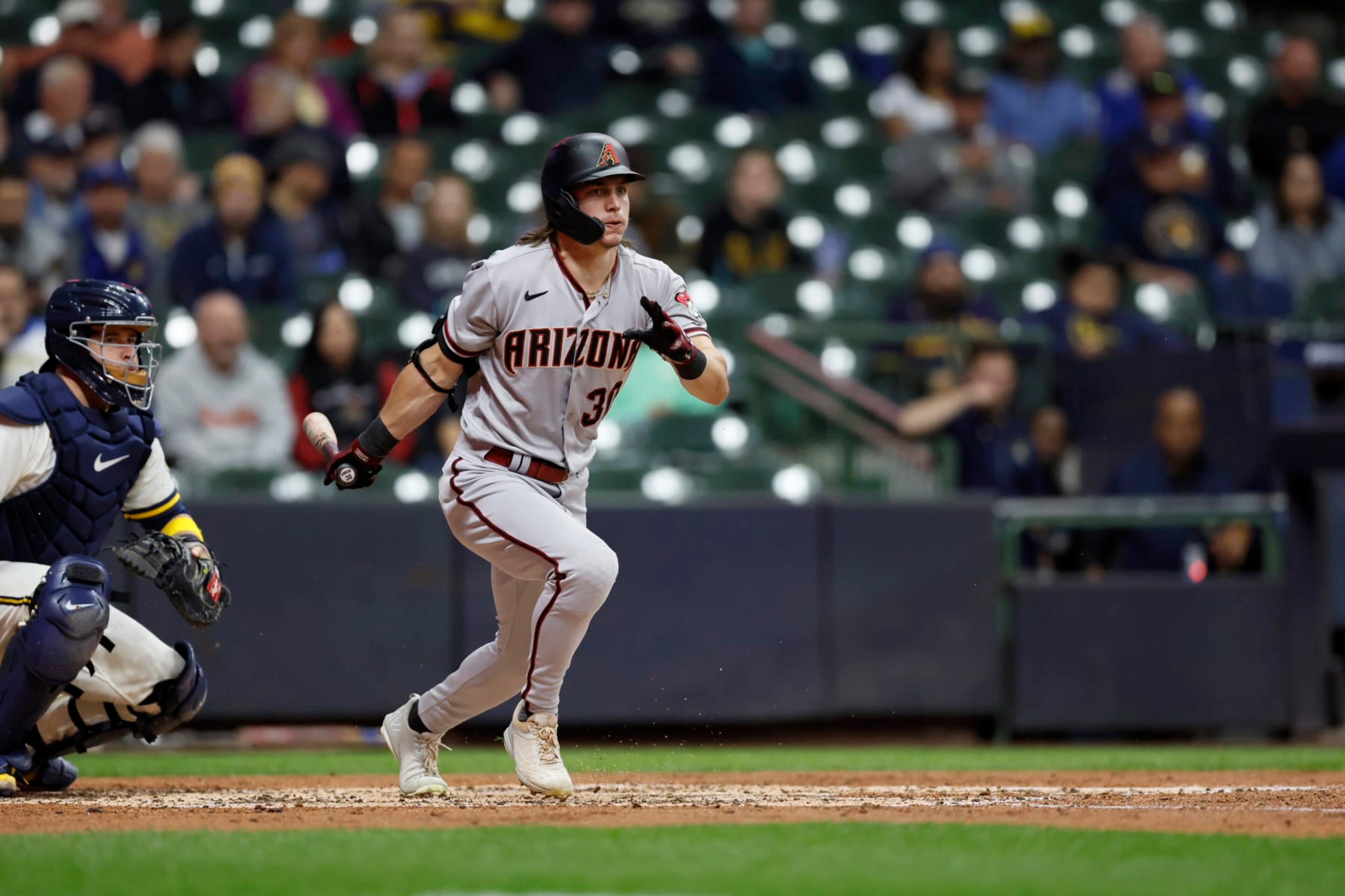 Baseball: Arizona Diamondbacks Jake McCarthy (30) in action, hitting and running to first base vs Milwaukee Brewers at American Family Field. 
Milwaukee, WI 10/3/2022 
CREDIT: David E. Klutho (Photo by David E. Klutho/Sports Illustrated via Getty Images) 
(Set Number: X164184 TK1)