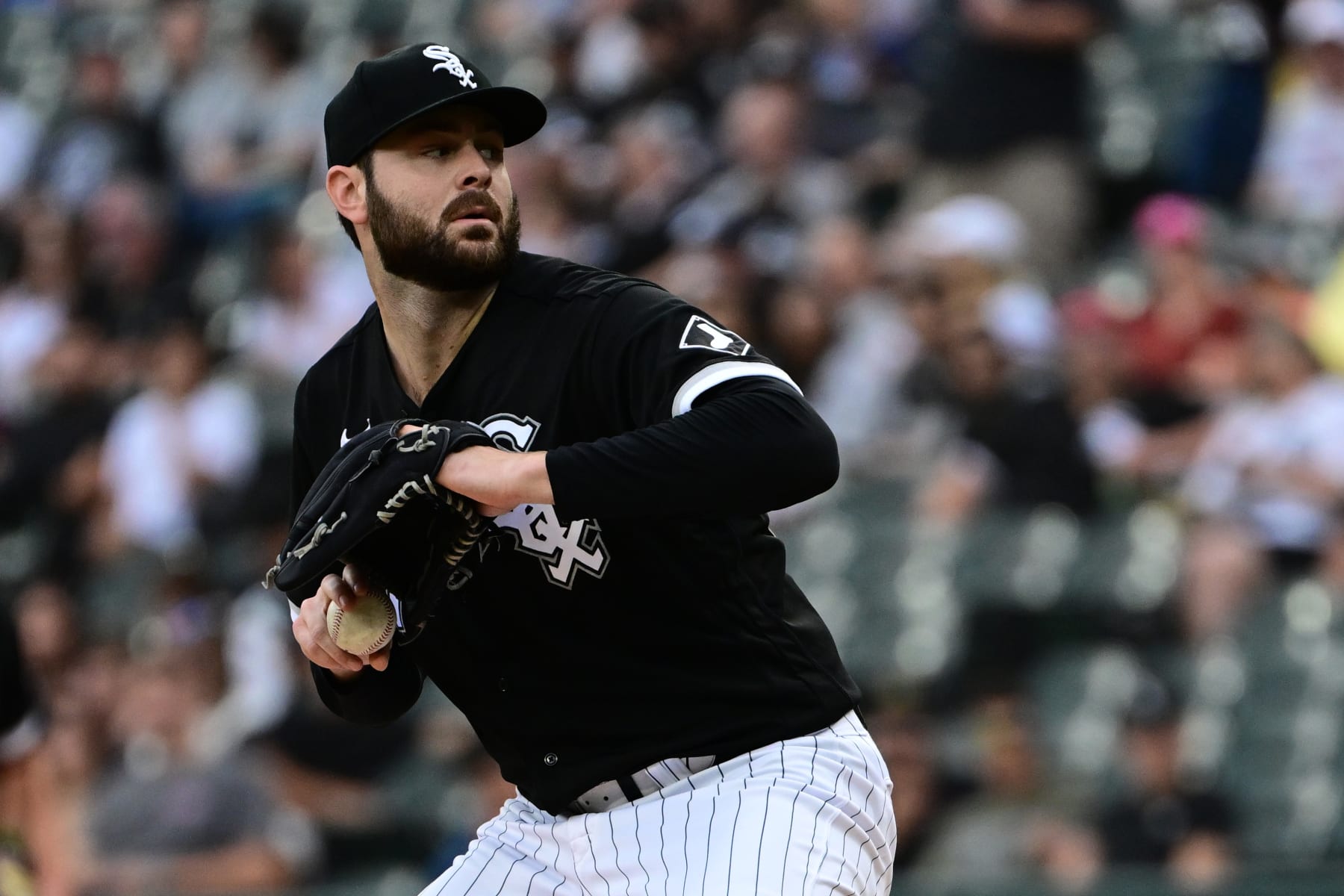 CHICAGO, ILLINOIS - AUGUST 13: Starting pitcher Lucas Giolito #27 of the Chicago White Sox delivers the baseball in the first inning against the Detroit Tigers at Guaranteed Rate Field on August 13, 2022 in Chicago, Illinois. (Photo by Quinn Harris/Getty Images)