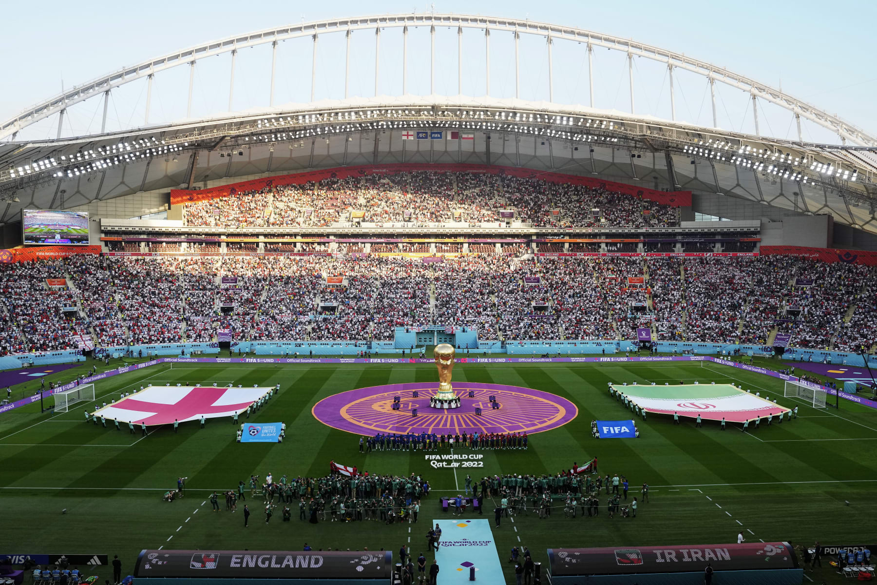 Teams line up prior the World Cup group B soccer match between England and Iran at the Khalifa International Stadium in Doha, Qatar, Monday, Nov. 21, 2022. (AP Photo/Pavel Golovkin) Teams line up prior the World Cup group B soccer match between England and Iran at the Khalifa International Stadium in Doha, Qatar, Monday, Nov. 21, 2022. (AP Photo/Pavel Golovkin)