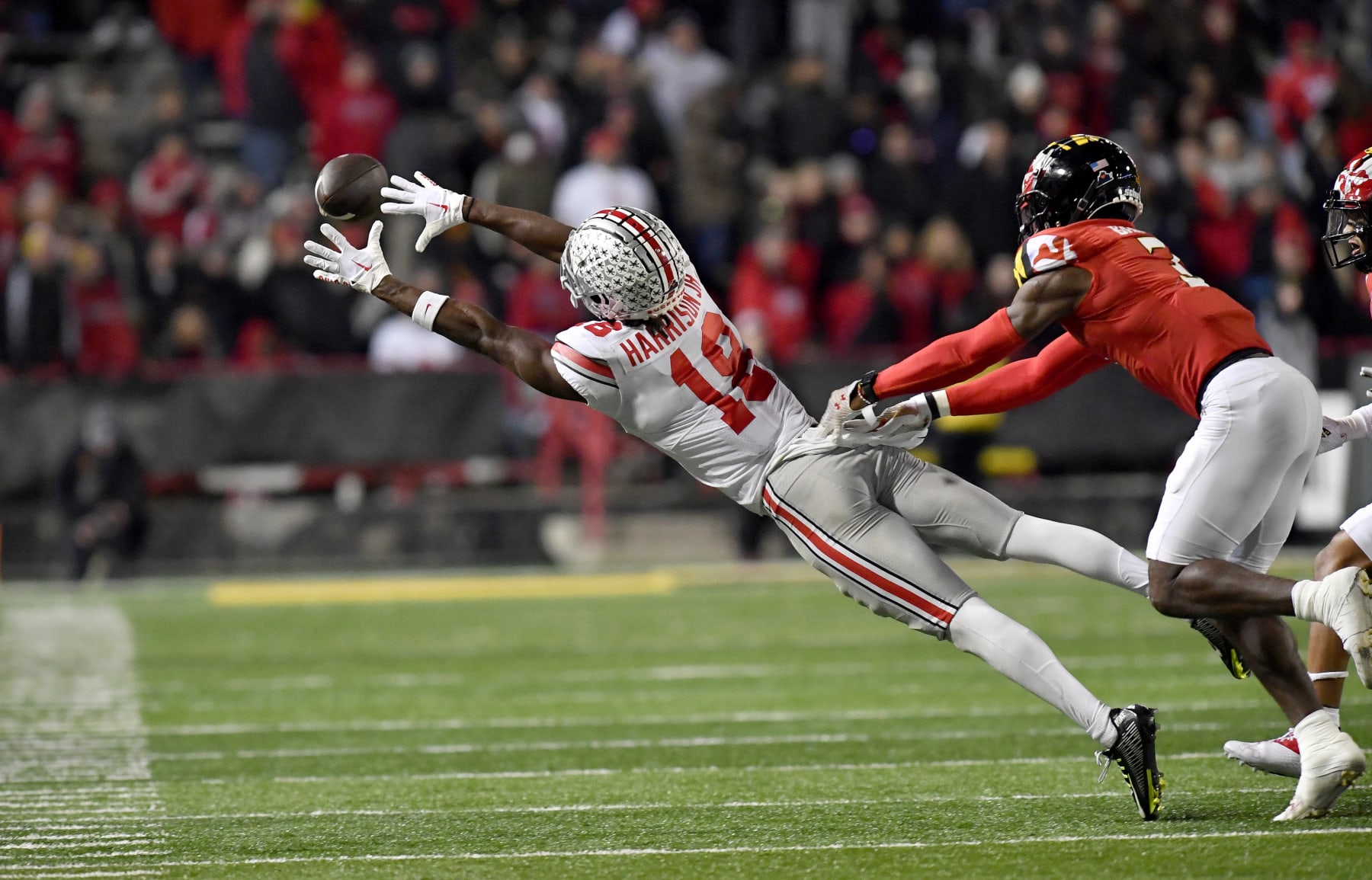 COLLEGE PARK, MD - NOVEMBER 19: Ohio State wide receiver Marvin Harrison, Jr. (18) lays out for a pass during the Ohio State Buckeyes versus Maryland Terrapins game on November 19, 2022 at Capital One Field at Maryland Stadium in College Park, MD. (Photo by Randy Litzinger/Icon Sportswire via Getty Images)