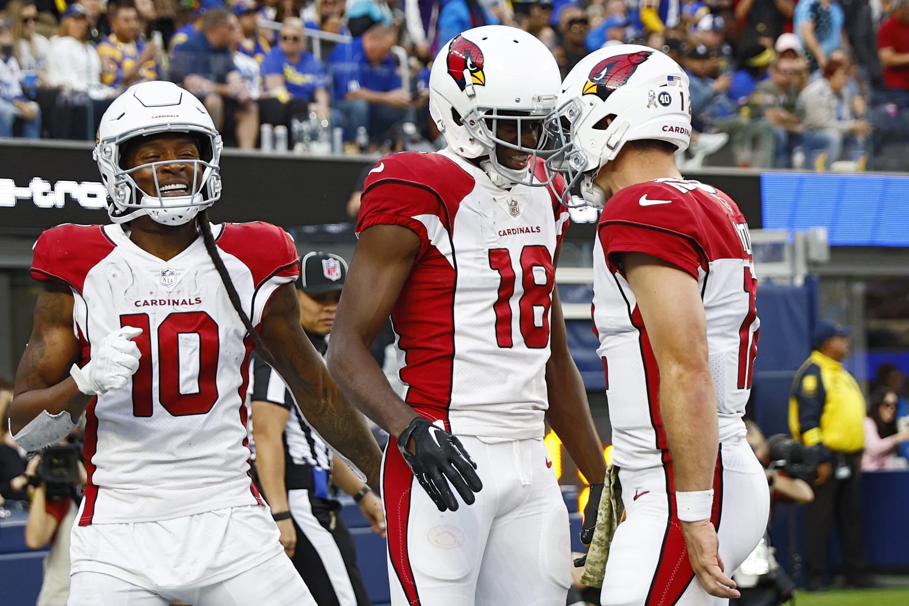 INGLEWOOD, CALIFORNIA - NOVEMBER 13: A.J. Green #18  celebrates with Colt McCoy #12 and DeAndre Hopkins #10 of the Arizona Cardinals after a touchdown in the second quarter of the game against the Los Angeles Rams at SoFi Stadium on November 13, 2022 in Inglewood, California. (Photo by Ronald Martinez/Getty Images)