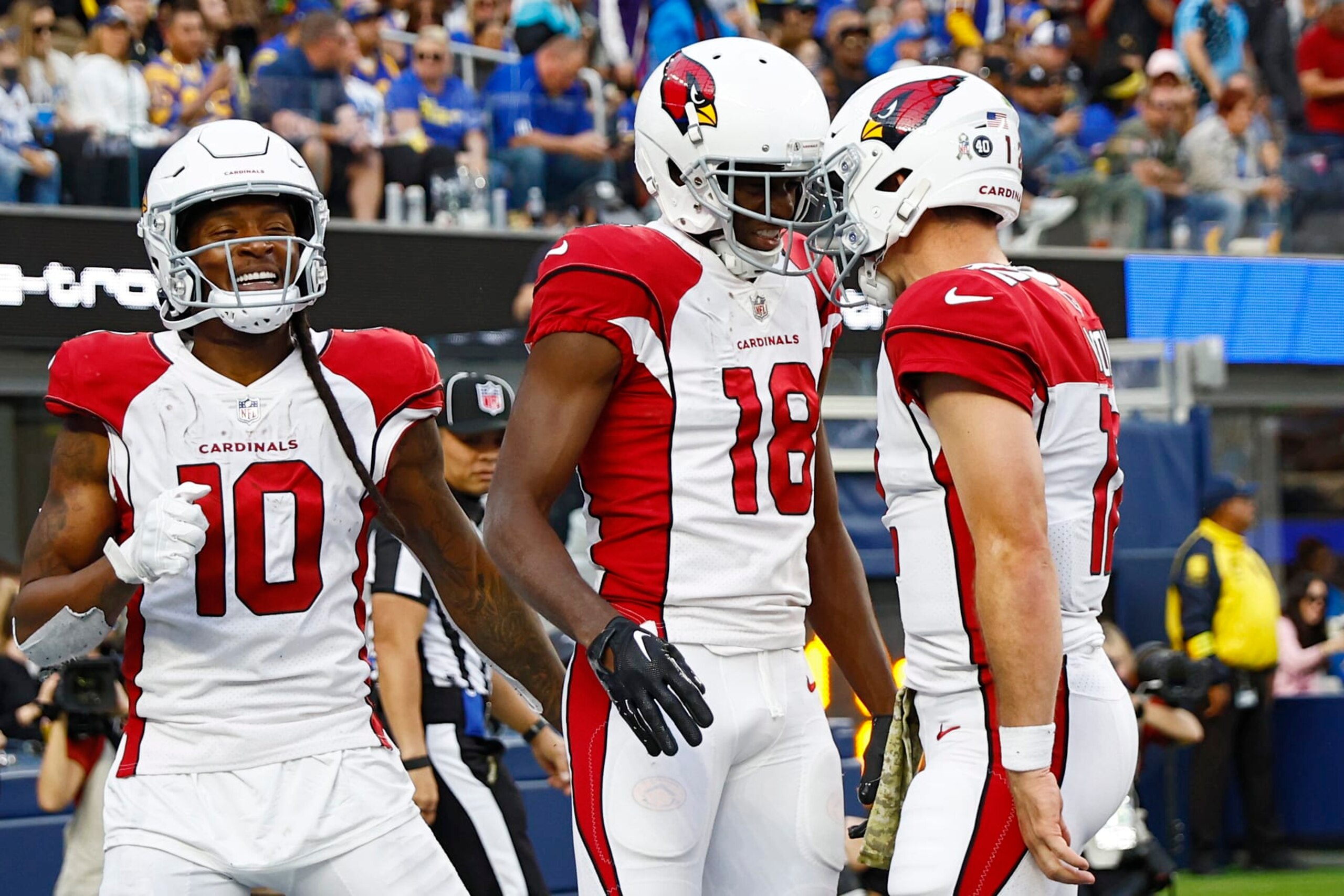 INGLEWOOD, CALIFORNIA - NOVEMBER 13: A.J. Green #18 celebrates with Colt McCoy #12 and DeAndre Hopkins #10 of the Arizona Cardinals after a touchdown in the second quarter of the game against the Los Angeles Rams at SoFi Stadium on November 13, 2022 in Inglewood, California. (Photo by Ronald Martinez/Getty Images) INGLEWOOD, CALIFORNIA - NOVEMBER 13: A.J. Green #18 celebrates with Colt McCoy #12 and DeAndre Hopkins #10 of the Arizona Cardinals after a touchdown in the second quarter of the game against the Los Angeles Rams at SoFi Stadium on November 13, 2022 in Inglewood, California. (Photo by Ronald Martinez/Getty Images)