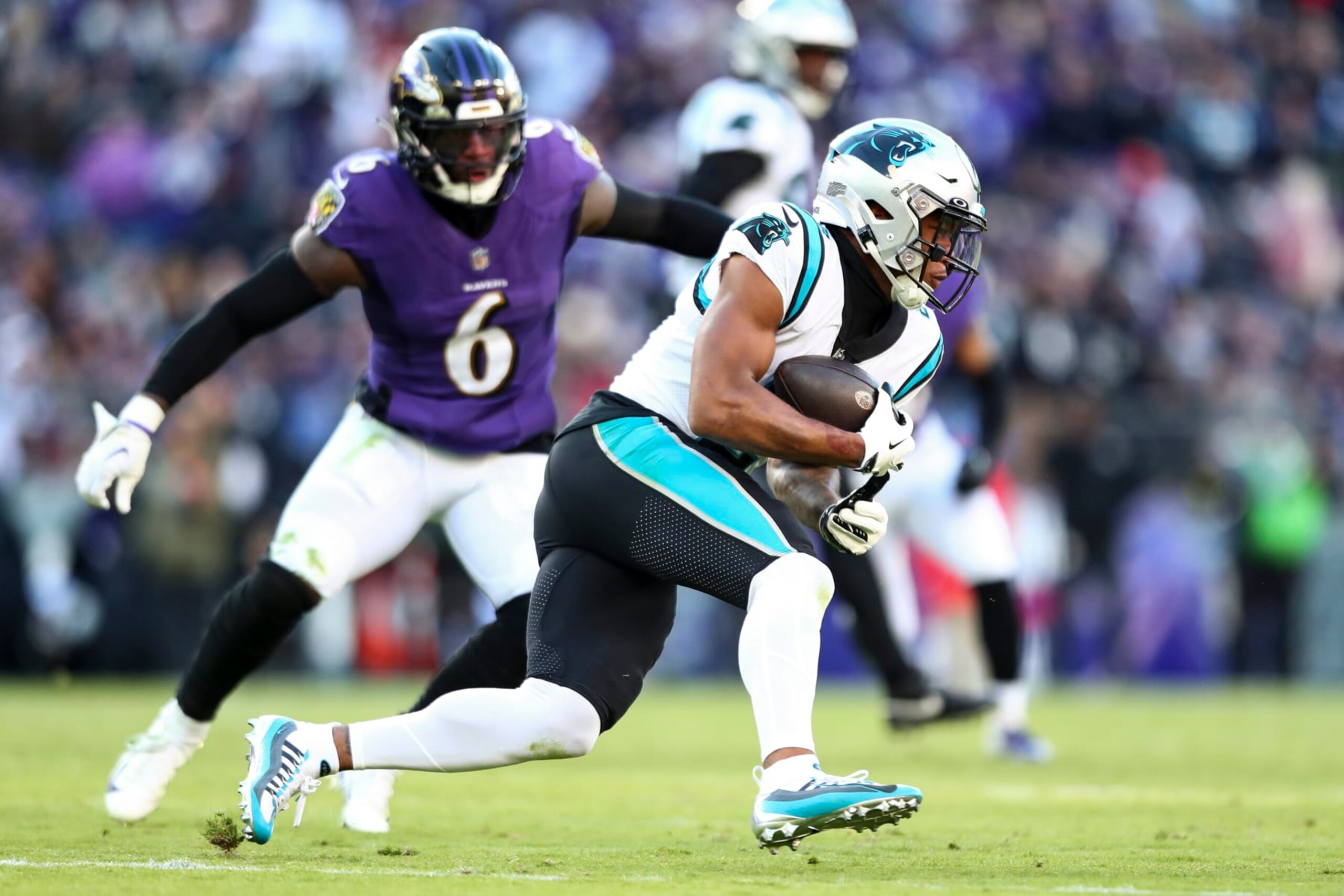 BALTIMORE, MD - NOVEMBER 20: DJ Moore #2 of the Carolina Panthers carries the ball during the third quarter of an NFL football game against the Baltimore Ravens at M&T Bank Stadium on November 20, 2022 in Baltimore, Maryland. (Photo by Kevin Sabitus/Getty Images) BALTIMORE, MD - NOVEMBER 20: DJ Moore #2 of the Carolina Panthers carries the ball during the third quarter of an NFL football game against the Baltimore Ravens at M&T Bank Stadium on November 20, 2022 in Baltimore, Maryland. (Photo by Kevin Sabitus/Getty Images)