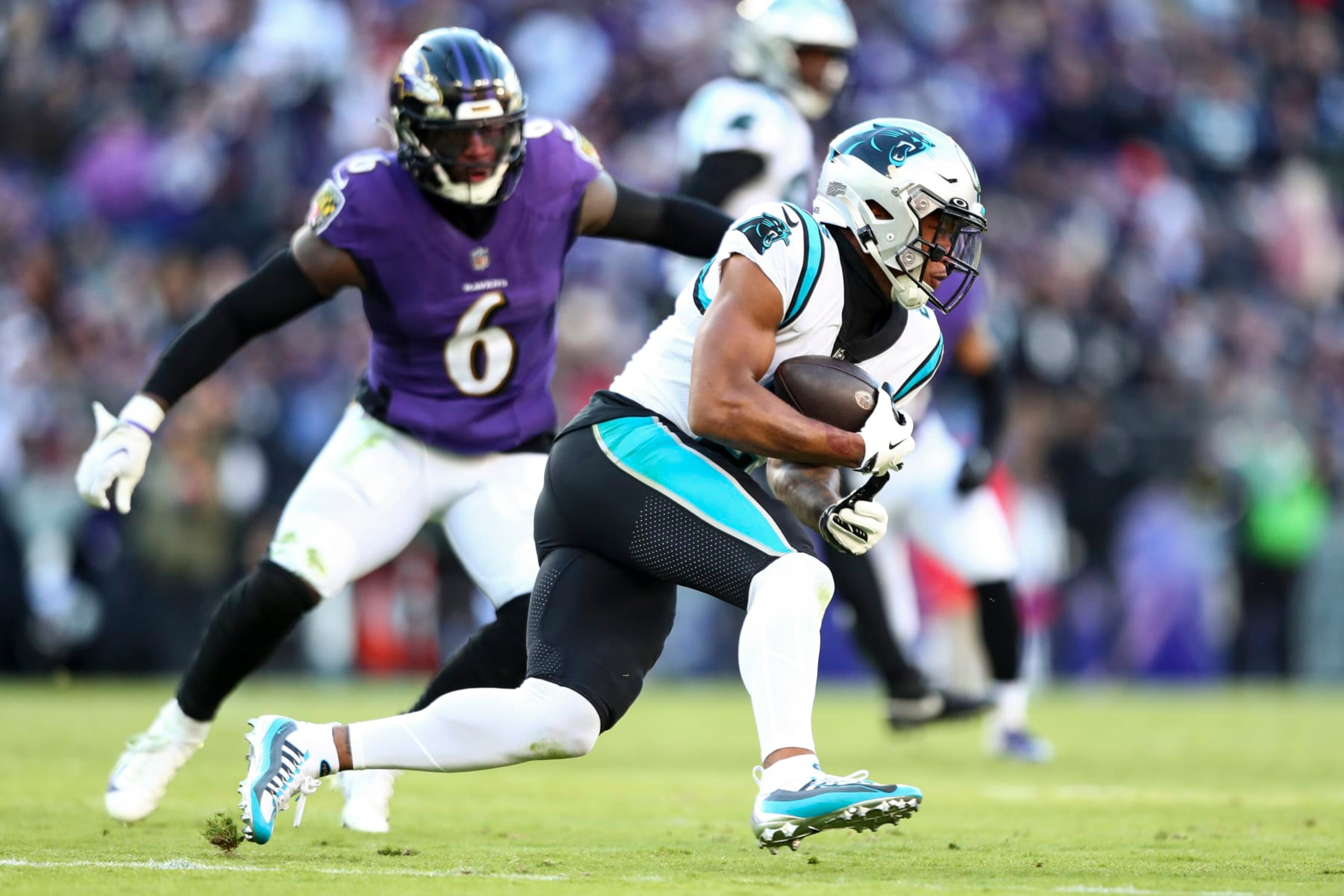 BALTIMORE, MD - NOVEMBER 20: DJ Moore #2 of the Carolina Panthers carries the ball during the third quarter of an NFL football game against the Baltimore Ravens at M&T Bank Stadium on November 20, 2022 in Baltimore, Maryland. (Photo by Kevin Sabitus/Getty Images)