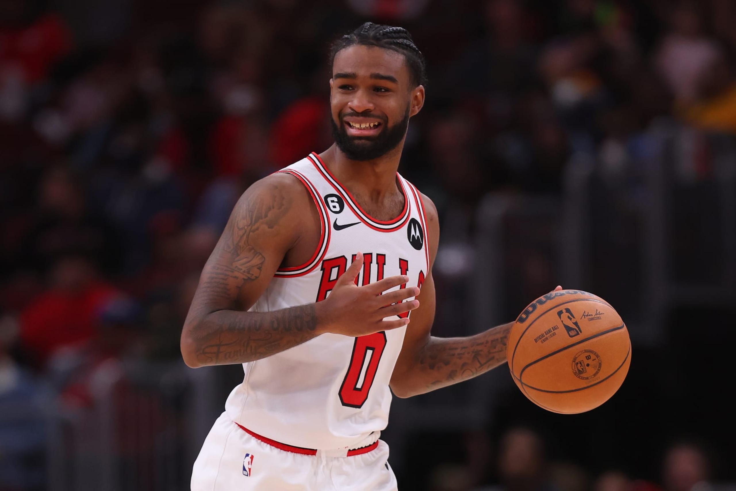 CHICAGO, ILLINOIS - OCTOBER 11: Coby White #0 of the Chicago Bulls dribbles up the court against the Milwaukee Bucks during the second half of a preseason game at United Center on October 11, 2022 in Chicago, Illinois. NOTE TO USER: User expressly acknowledges and agrees that, by downloading and or using this photograph, User is consenting to the terms and conditions of the Getty Images License Agreement. (Photo by Michael Reaves/Getty Images)