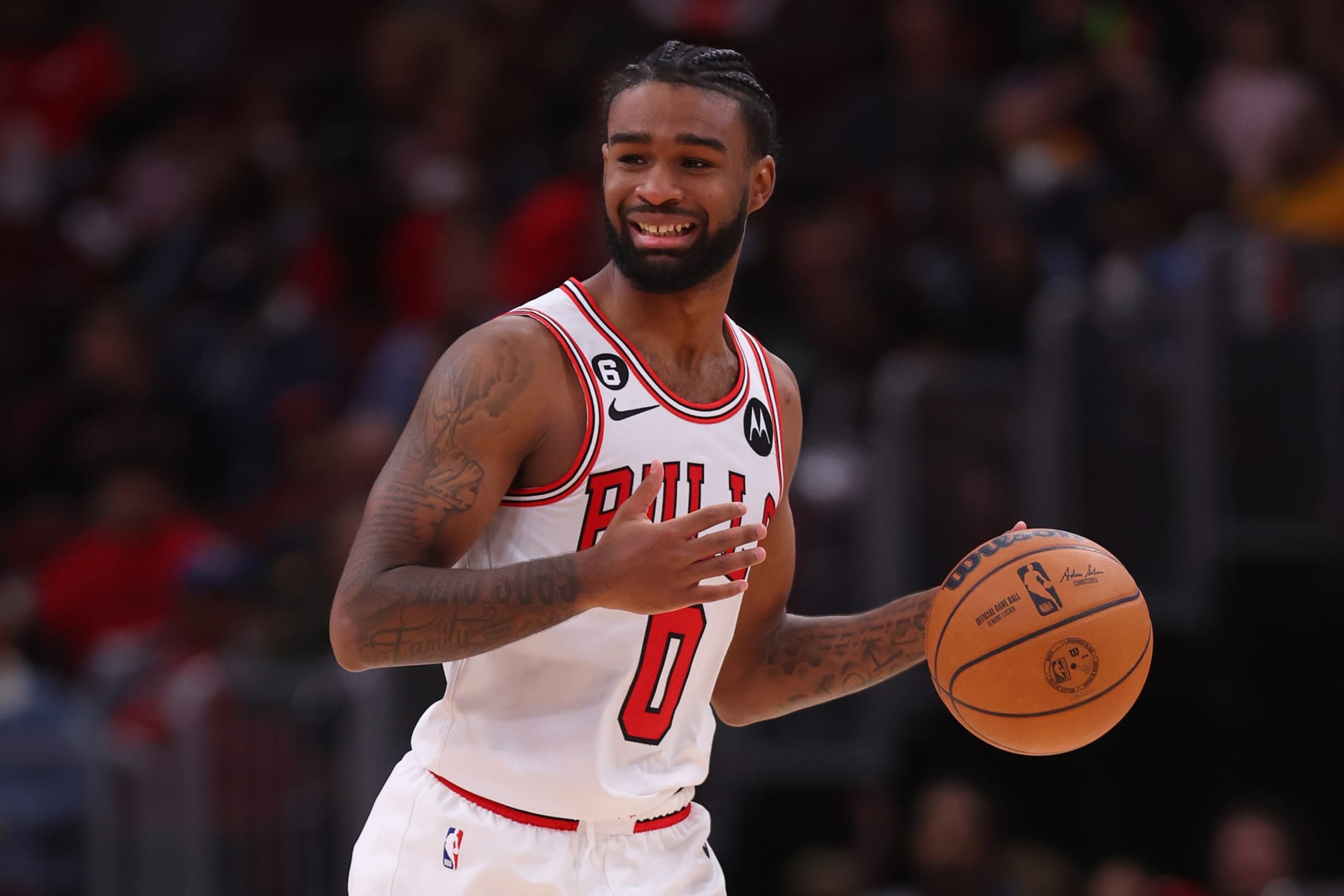 CHICAGO, ILLINOIS - OCTOBER 11: Coby White #0 of the Chicago Bulls dribbles up the court against the Milwaukee Bucks during the second half of a preseason game at United Center on October 11, 2022 in Chicago, Illinois. NOTE TO USER: User expressly acknowledges and agrees that, by downloading and or using this photograph, User is consenting to the terms and conditions of the Getty Images License Agreement. (Photo by Michael Reaves/Getty Images)