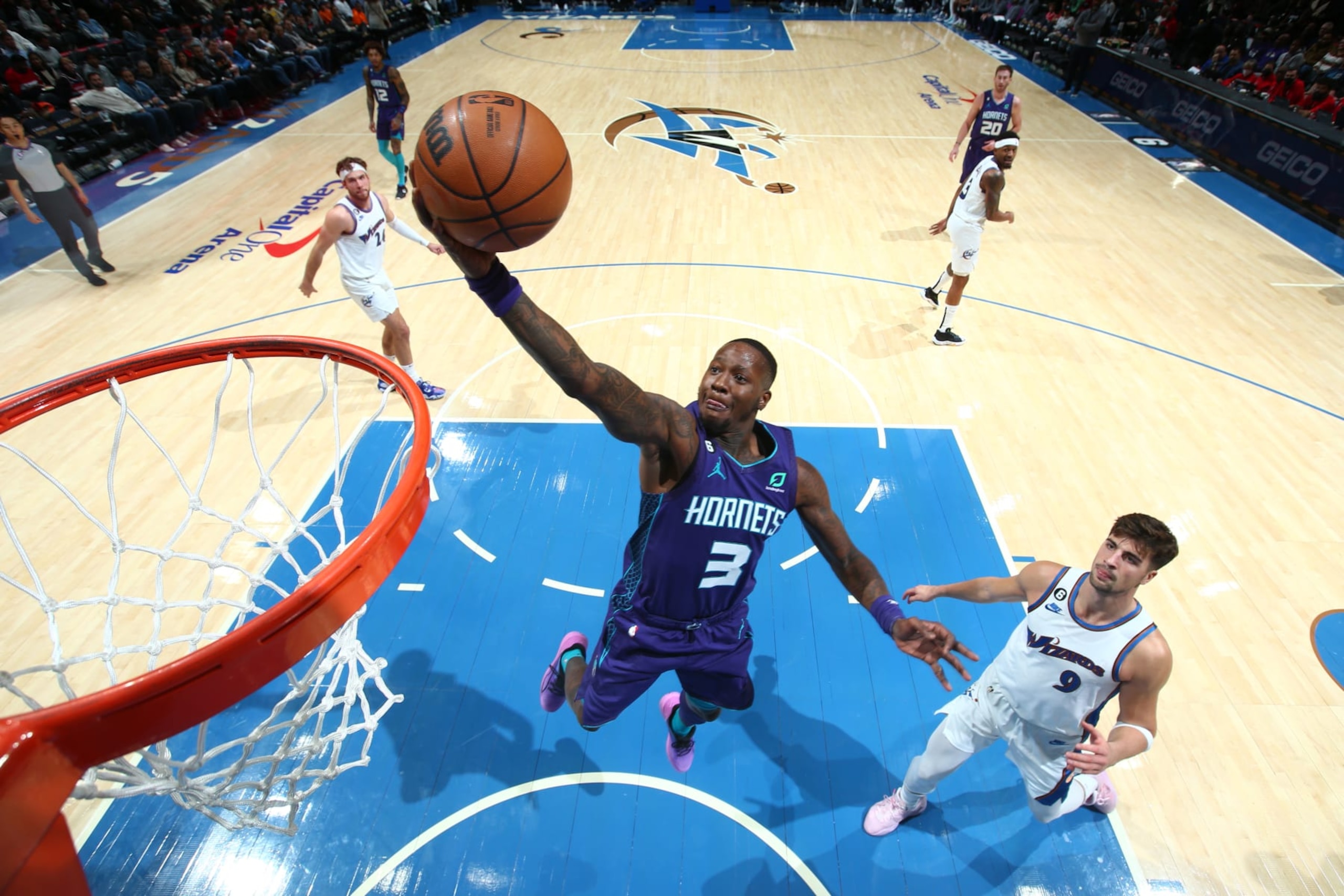 WASHINGTON, DC -  NOVEMBER 20: Terry Rozier #3 of the Charlotte Hornets drives to the basket during the game against the Washington Wizards on November 20, 2022 at Capital One Arena in Washington, DC. NOTE TO USER: User expressly acknowledges and agrees that, by downloading and or using this Photograph, user is consenting to the terms and conditions of the Getty Images License Agreement. Mandatory Copyright Notice: Copyright 2022 NBAE (Photo by Stephen Gosling/NBAE via Getty Images)