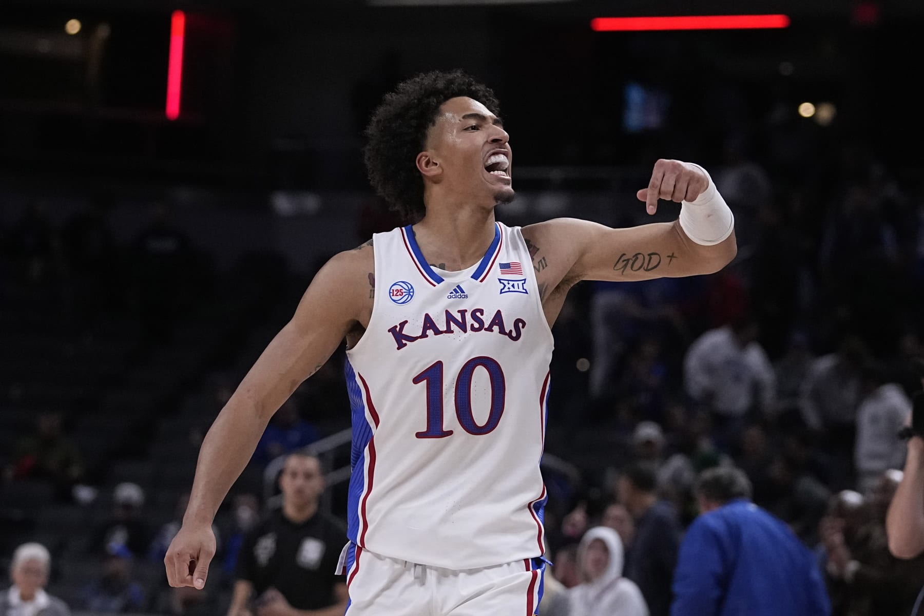 Kansas forward Jalen Wilson (10) reacts to a scar against Duke during the second half of an NCAA college basketball game, Wednesday, Nov. 16, 2022, in Indianapolis. (AP Photo/Darron Cummings)