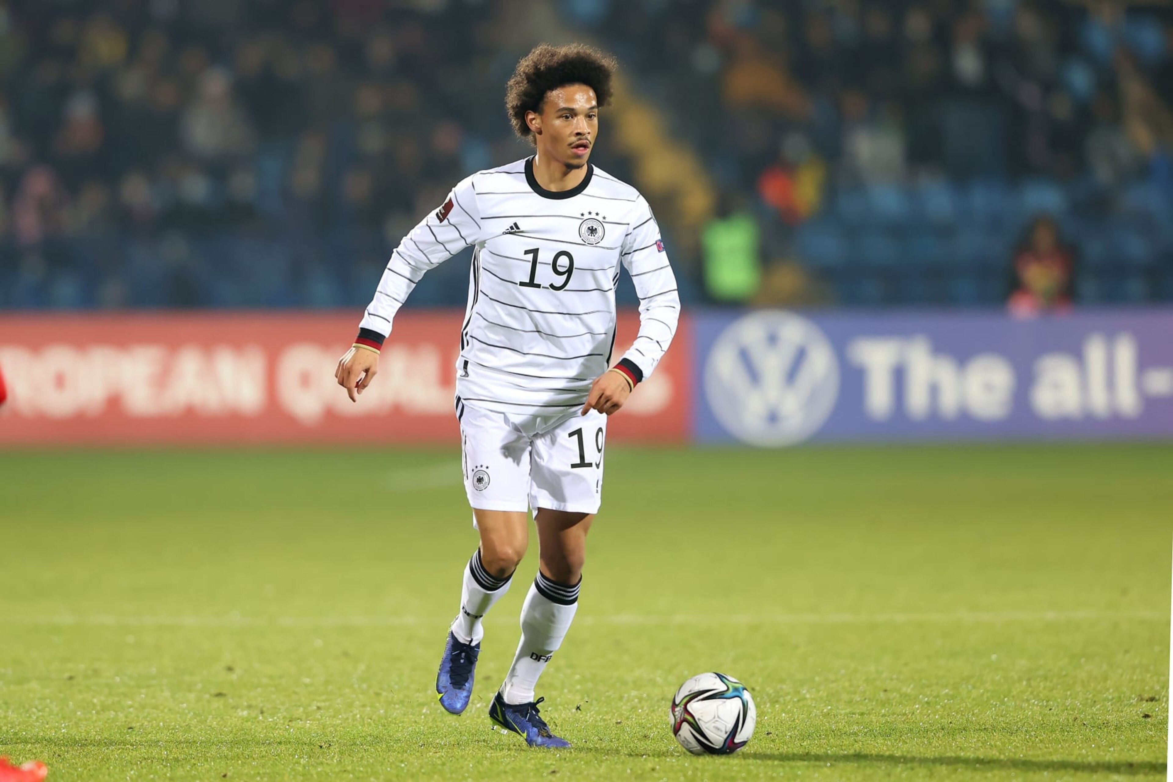 YEREVAN, ARMENIA - NOVEMBER 14: Leroy Sane of Germany runs with the ball during the 2022 FIFA World Cup Qualifier match between Armenia and Germany at Republican Stadium after Vazgen Sargsyan on November 14, 2021 in Yerevan, Armenia. (Photo by Alexander Hassenstein/Getty Images) YEREVAN, ARMENIA - NOVEMBER 14: Leroy Sane of Germany runs with the ball during the 2022 FIFA World Cup Qualifier match between Armenia and Germany at Republican Stadium after Vazgen Sargsyan on November 14, 2021 in Yerevan, Armenia. (Photo by Alexander Hassenstein/Getty Images)
