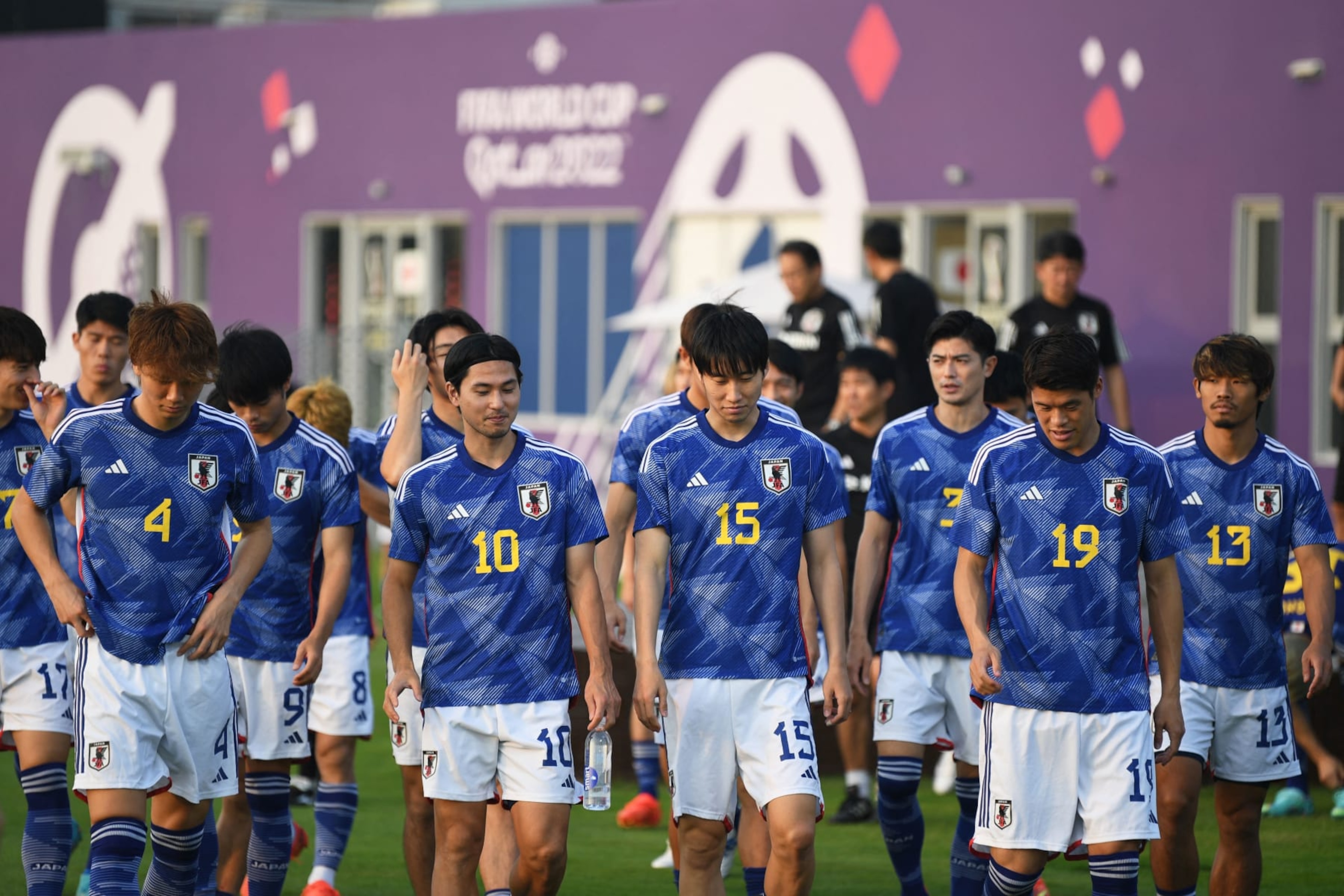 (From L) Japan's defender Kou Itakura, Japan's midfielder Takumi Minamino, Japan's midfielder Daichi Kamada, Japan's defender Hiroki Sakai arrive for a training session at the Al Sadd SC training grounds in Doha on November 19, 2022, ahead of the Qatar 2022 World Cup football tournament. (Photo by Philip FONG / AFP) (Photo by PHILIP FONG/AFP via Getty Images) (From L) Japan's defender Kou Itakura, Japan's midfielder Takumi Minamino, Japan's midfielder Daichi Kamada, Japan's defender Hiroki Sakai arrive for a training session at the Al Sadd SC training grounds in Doha on November 19, 2022, ahead of the Qatar 2022 World Cup football tournament. (Photo by Philip FONG / AFP) (Photo by PHILIP FONG/AFP via Getty Images)