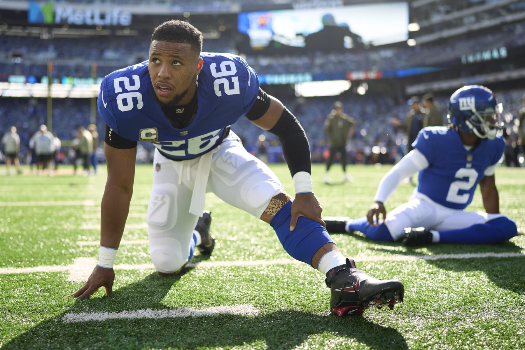 EAST RUTHERFORD, NJ - NOVEMBER 13: Saquon Barkley #26 of the New York Giants warms up before kickoff against the Houston Texans at MetLife Stadium on November 13, 2022 in East Rutherford, New Jersey. (Photo by Cooper Neill/Getty Images)