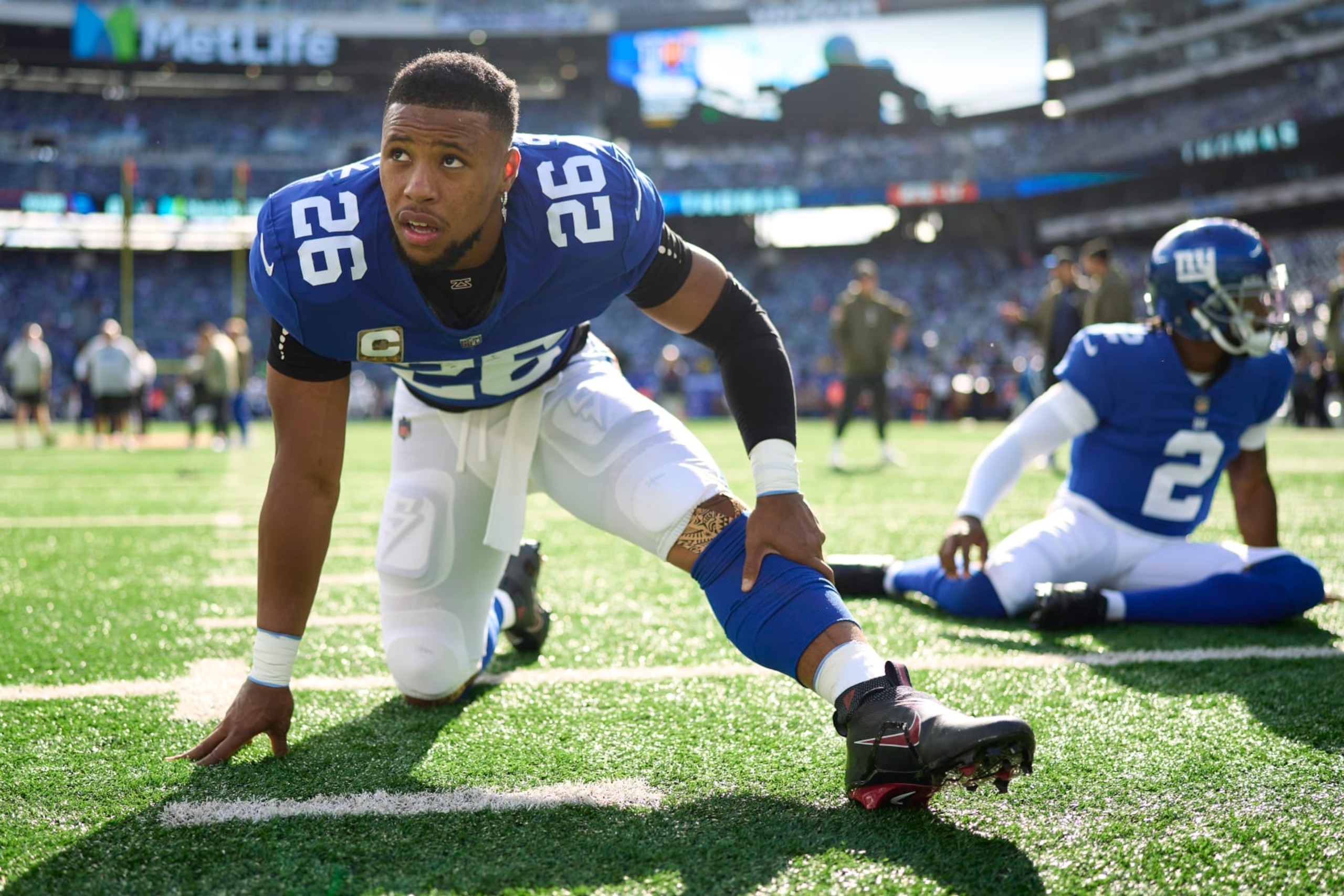 EAST RUTHERFORD, NJ - NOVEMBER 13: Saquon Barkley #26 of the New York Giants warms up before kickoff against the Houston Texans at MetLife Stadium on November 13, 2022 in East Rutherford, New Jersey. (Photo by Cooper Neill/Getty Images) EAST RUTHERFORD, NJ - NOVEMBER 13: Saquon Barkley #26 of the New York Giants warms up before kickoff against the Houston Texans at MetLife Stadium on November 13, 2022 in East Rutherford, New Jersey. (Photo by Cooper Neill/Getty Images)