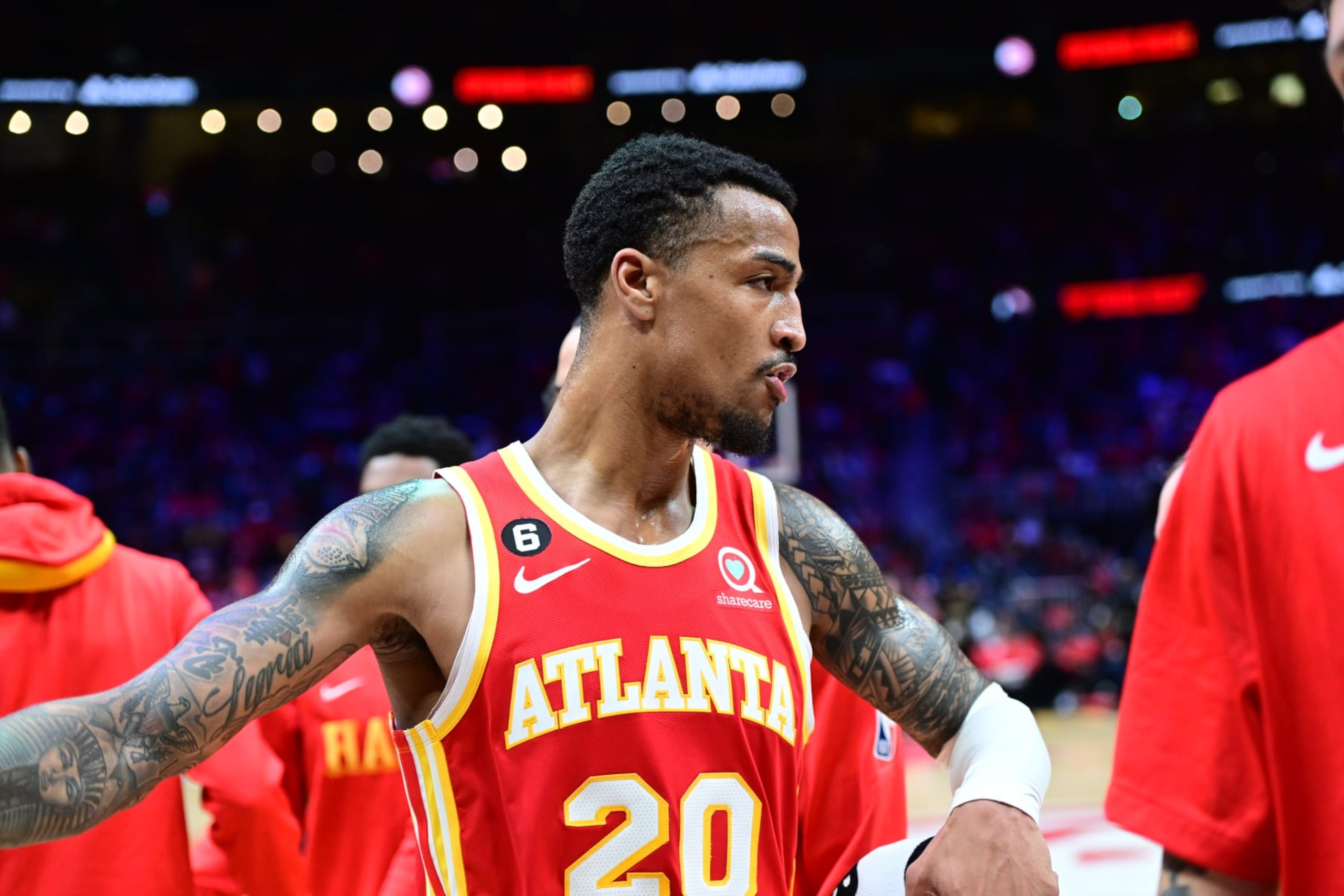 ATLANTA, GA - OCTOBER 10: John Collins #20 of the Atlanta Hawks looks on during the game against the Houston Rockets on October 10, 2022 at State Farm Arena in Atlanta, Georgia.  NOTE TO USER: User expressly acknowledges and agrees that, by downloading and/or using this Photograph, user is consenting to the terms and conditions of the Getty Images License Agreement. Mandatory Copyright Notice: Copyright 2022 NBAE (Photo by Adam Hagy/NBAE via Getty Images)
