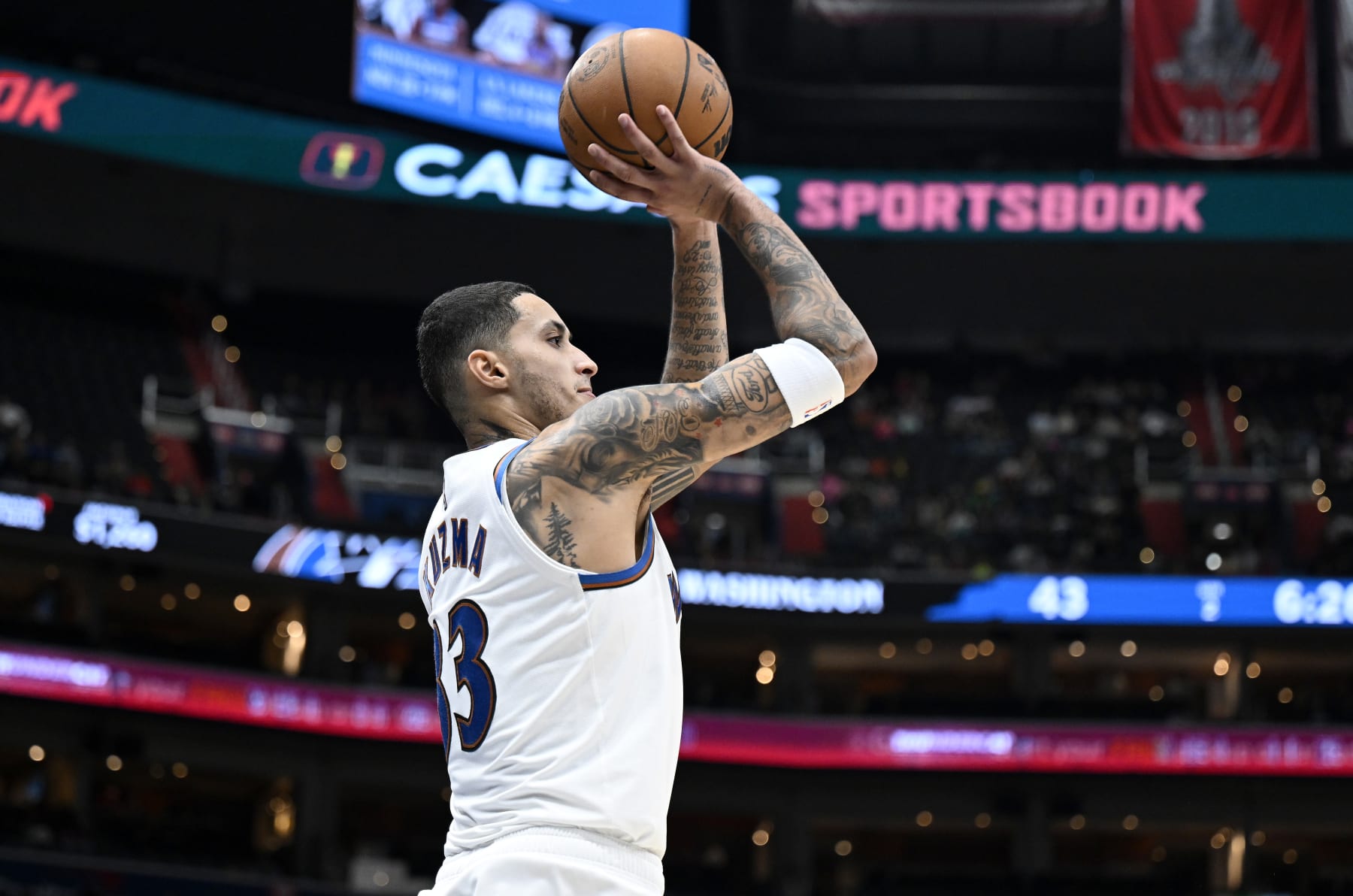 WASHINGTON, DC - NOVEMBER 20: Kyle Kuzma #33 of the Washington Wizards shoots the ball in the second quarter against the Charlotte Hornets at Capital One Arena on November 20, 2022 in Washington, DC. NOTE TO USER: User expressly acknowledges and agrees that, by downloading and or using this photograph, User is consenting to the terms and conditions of the Getty Images License Agreement. (Photo by G Fiume/Getty Images)