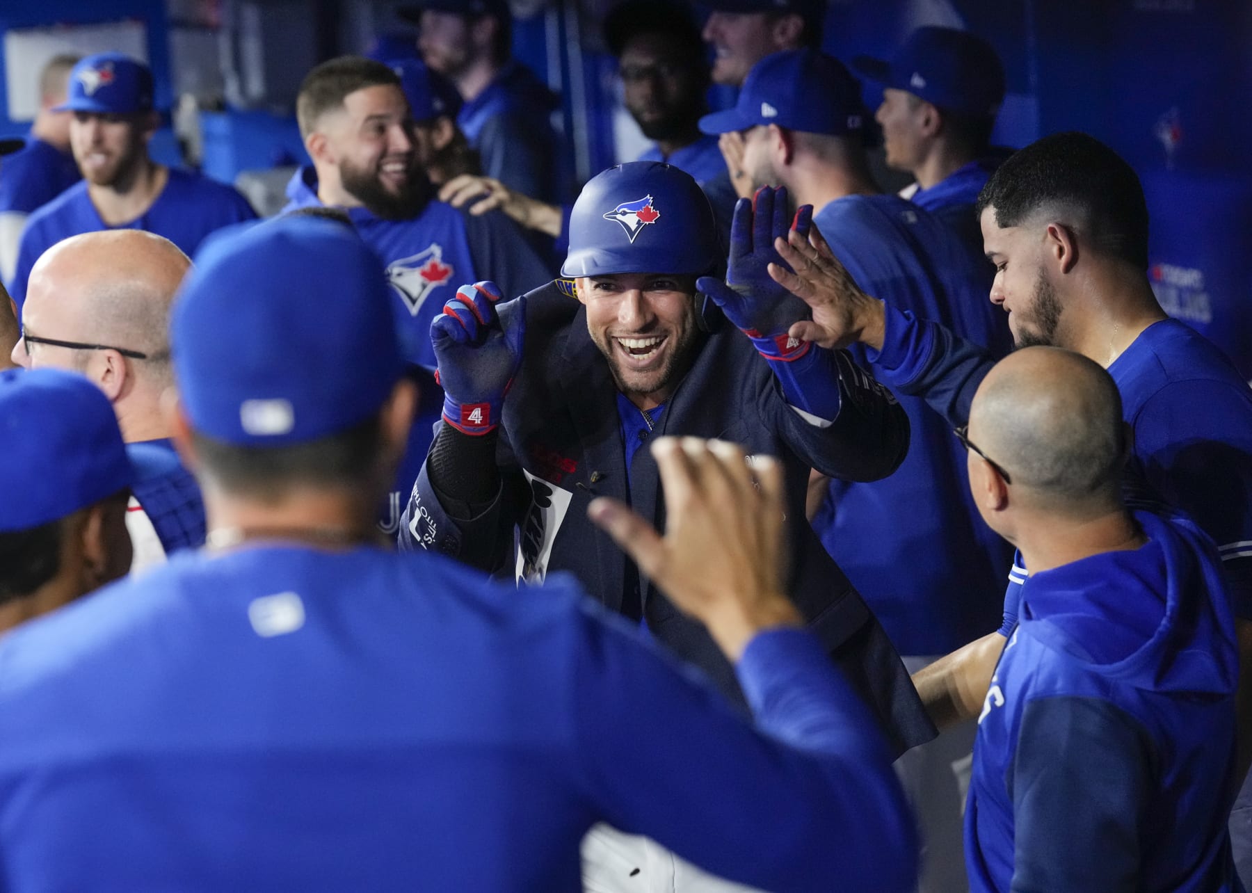 TORONTO, ON - SEPTEMBER 27: George Springer #4 of the Toronto Blue Jays celebrates his home run with the blue jacket against the New York Yankees in the first inning during their MLB game at the Rogers Centre on September 27, 2022 in Toronto, Ontario, Canada. (Photo by Mark Blinch/Getty Images)