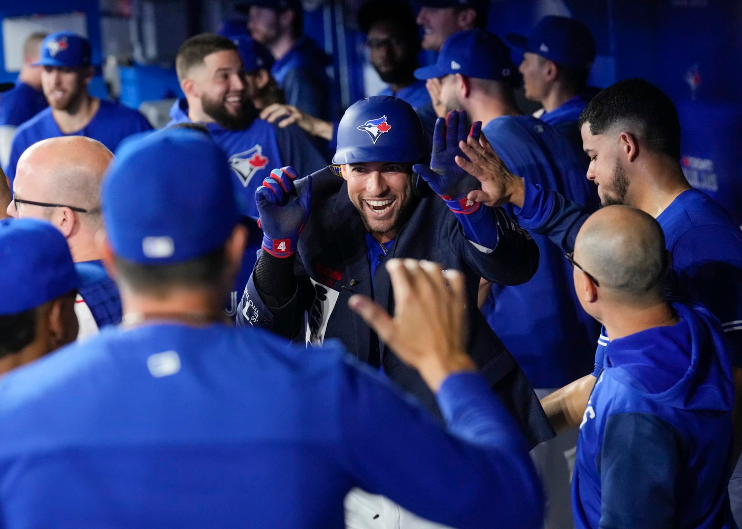 TORONTO, ON - SEPTEMBER 27: George Springer #4 of the Toronto Blue Jays celebrates his home run with the blue jacket against the New York Yankees in the first inning during their MLB game at the Rogers Centre on September 27, 2022 in Toronto, Ontario, Canada. (Photo by Mark Blinch/Getty Images)