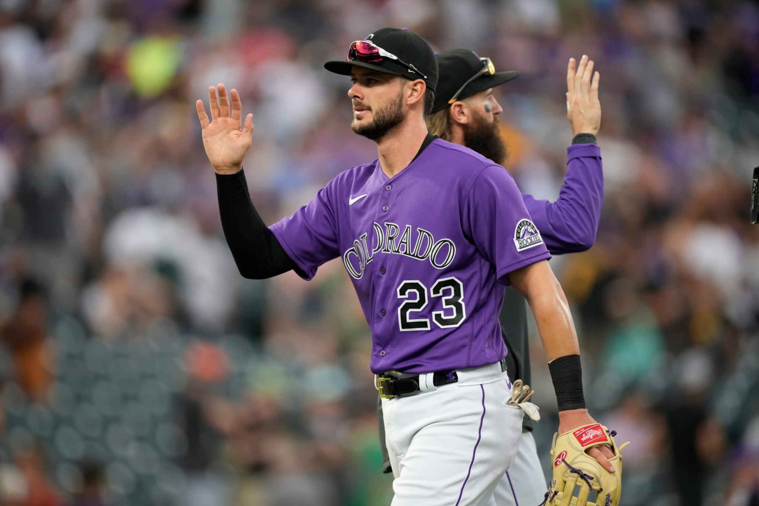 Colorado Rockies left fielder Kris Bryant (23) after the ninth inning of a baseball game Saturday, July 16, 2022, in Denver. (AP Photo/David Zalubowski)