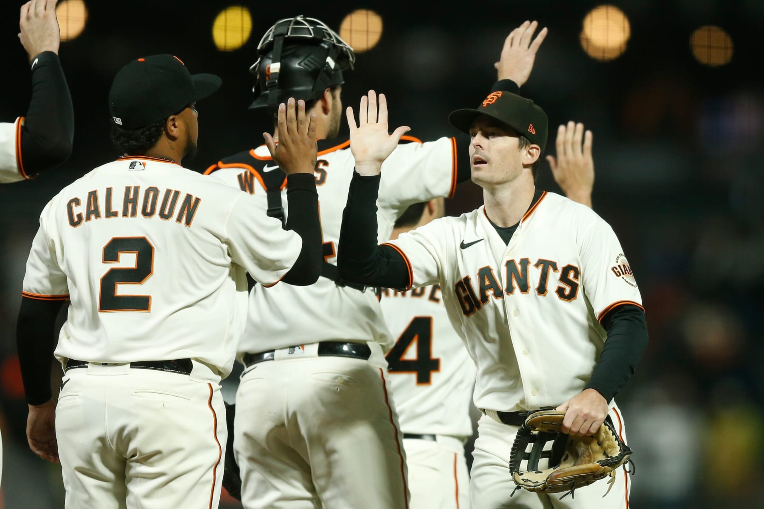 SAN FRANCISCO, CALIFORNIA - SEPTEMBER 12: Mike Yastrzemski #5 of the San Francisco Giants celebrates with teammates after a win against the Atlanta Braves at Oracle Park on September 12, 2022 in San Francisco, California. (Photo by Lachlan Cunningham/Getty Images)