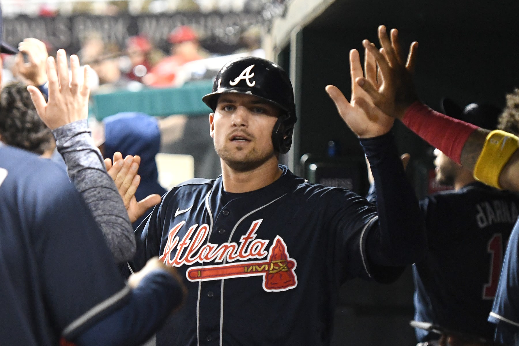 WASHINGTON, DC - SEPTEMBER 26:  Austin Riley #27 of the Atlanta Braves celebrates scoring a run in the sixth inning against the Washington Nationals at Nationals Park on September 26, 2022 in Washington, DC.  (Photo by Mitchell Layton/Getty Images)