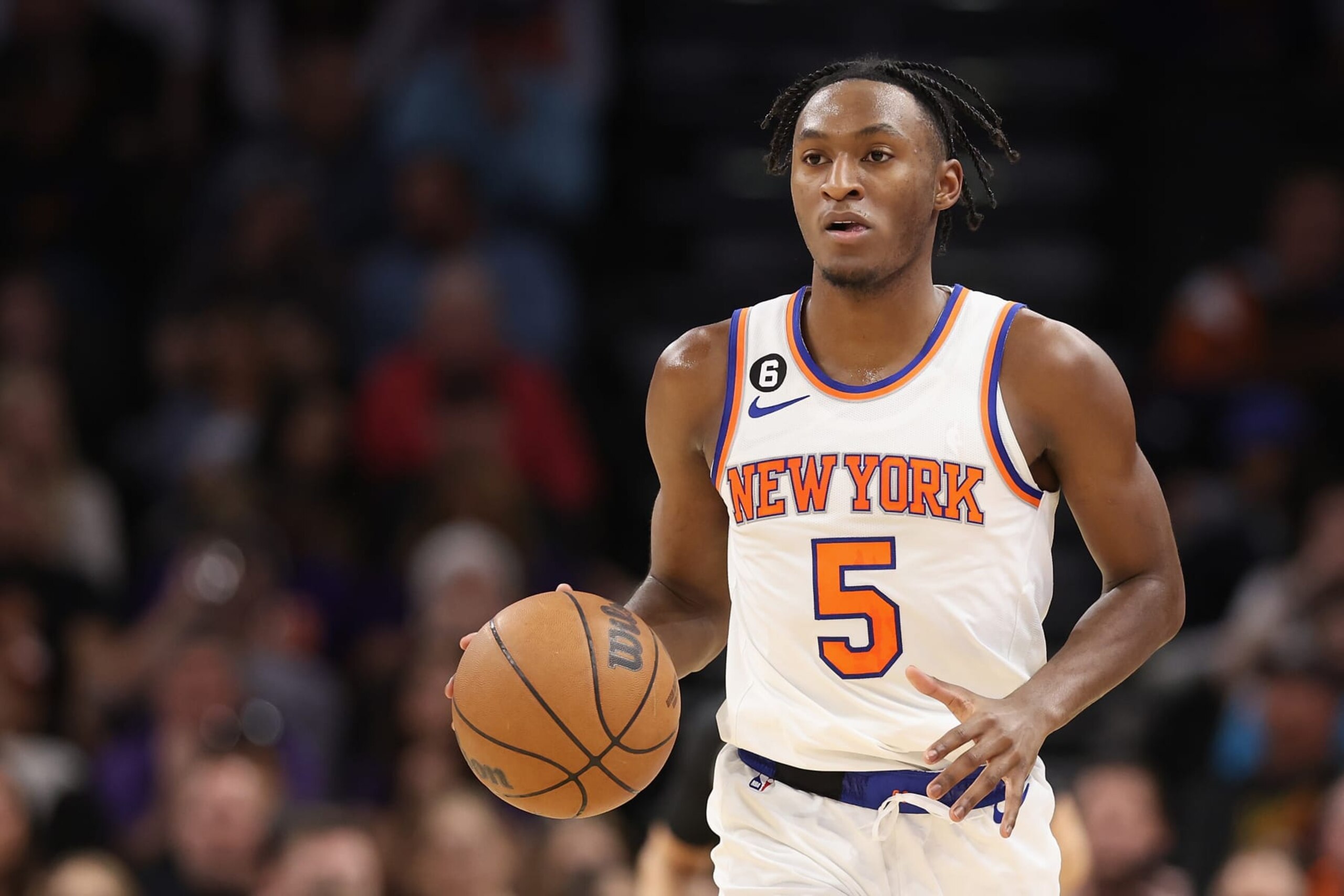 PHOENIX, ARIZONA - NOVEMBER 20: Immanuel Quickley #5 of the New York Knicks handles the ball during the first half of the NBA game at Footprint Center on November 20, 2022 in Phoenix, Arizona.  NOTE TO USER: User expressly acknowledges and agrees that, by downloading and or using this photograph, User is consenting to the terms and conditions of the Getty Images License Agreement.  (Photo by Christian Petersen/Getty Images)