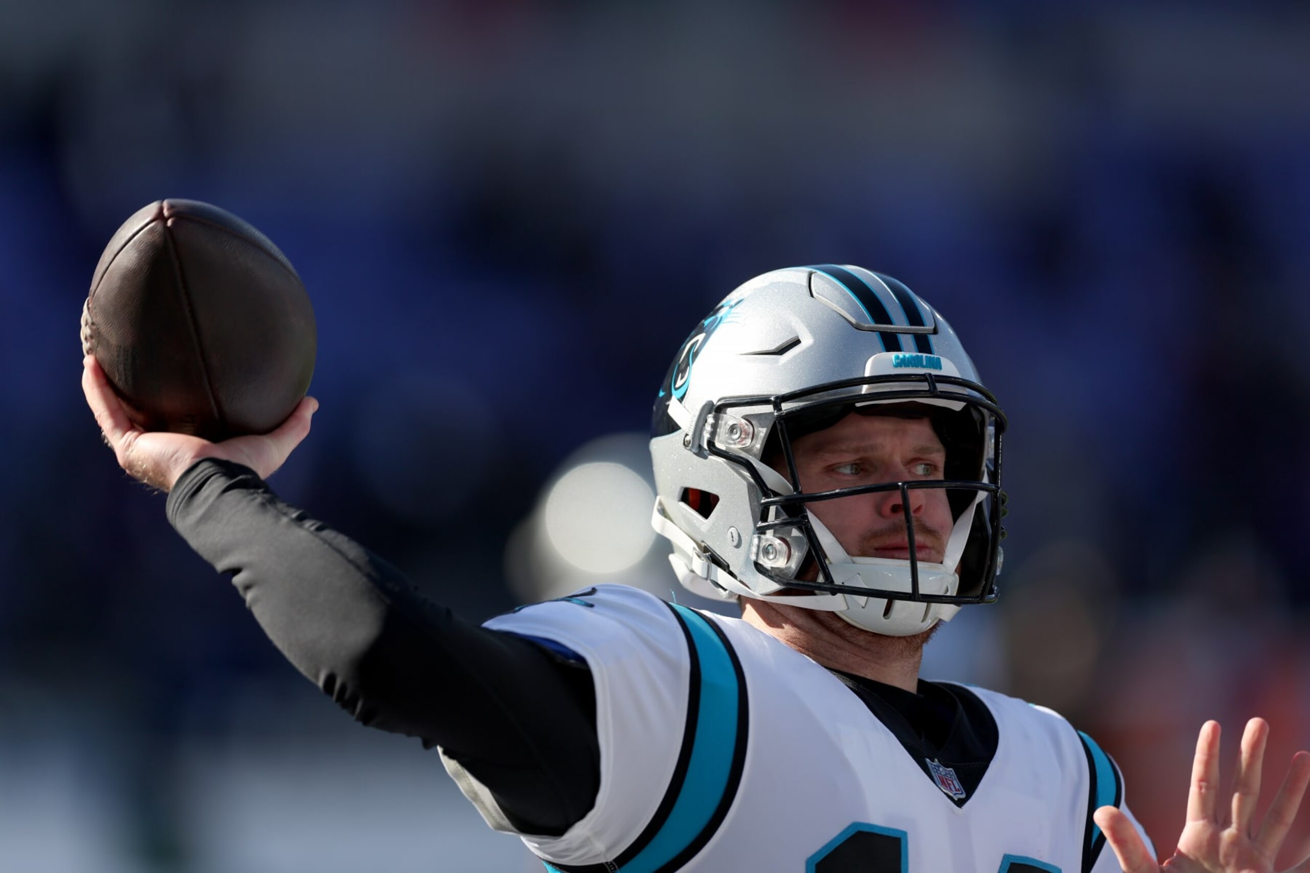 BALTIMORE, MARYLAND - NOVEMBER 20: Quarterback Sam Darnold #14 of the Carolina Panthers warms up against the Baltimore Ravens at M&T Bank Stadium on November 20, 2022 in Baltimore, Maryland. (Photo by Rob Carr/Getty Images)
