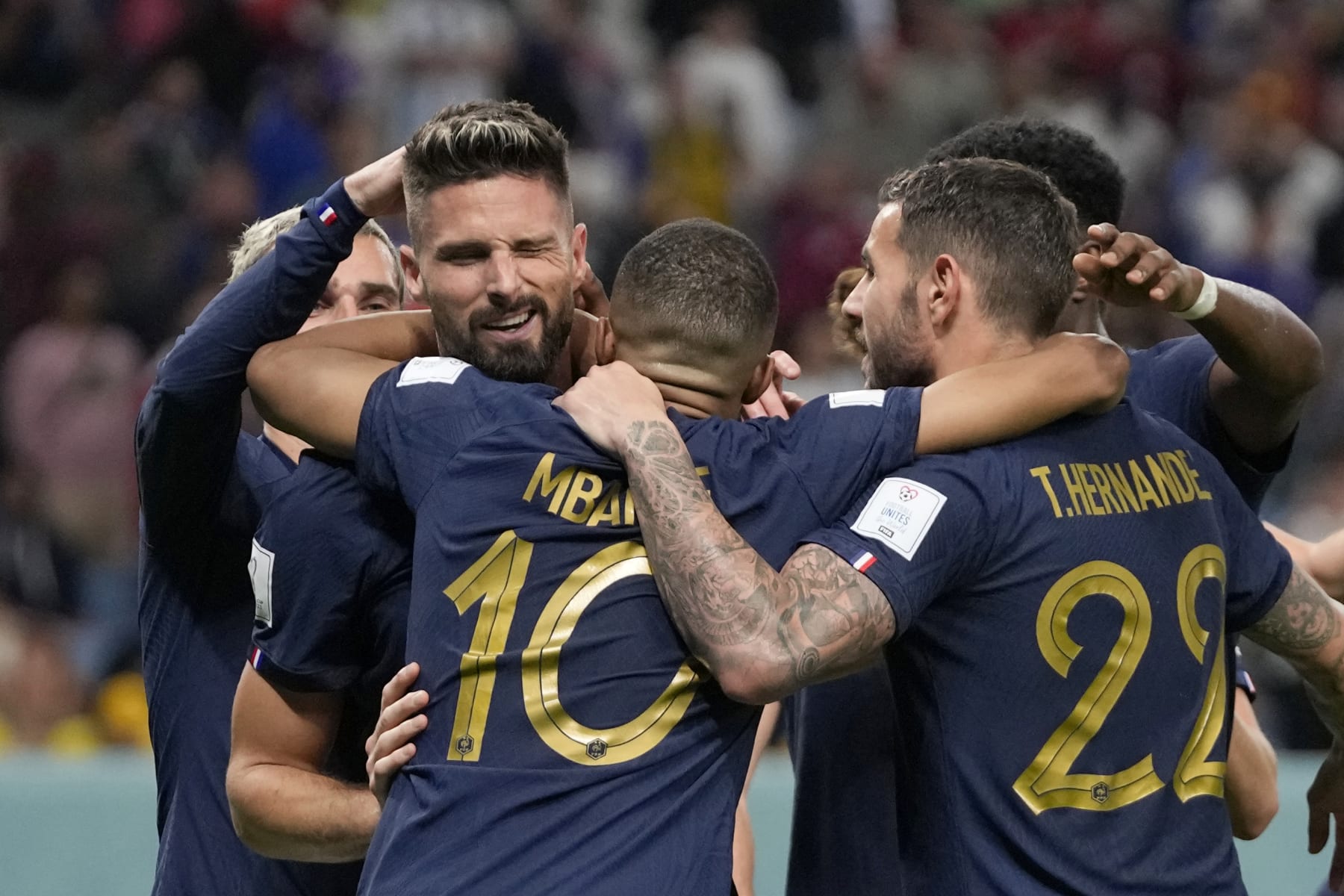 France's Olivier Giroud, 2nd left, celebrates after scoring his side's fourth goal during the World Cup group D soccer match between France and Australia, at the Al Janoub Stadium in Al Wakrah, Qatar, Tuesday, Nov. 22, 2022. (AP Photo/Thanassis Stavrakis)