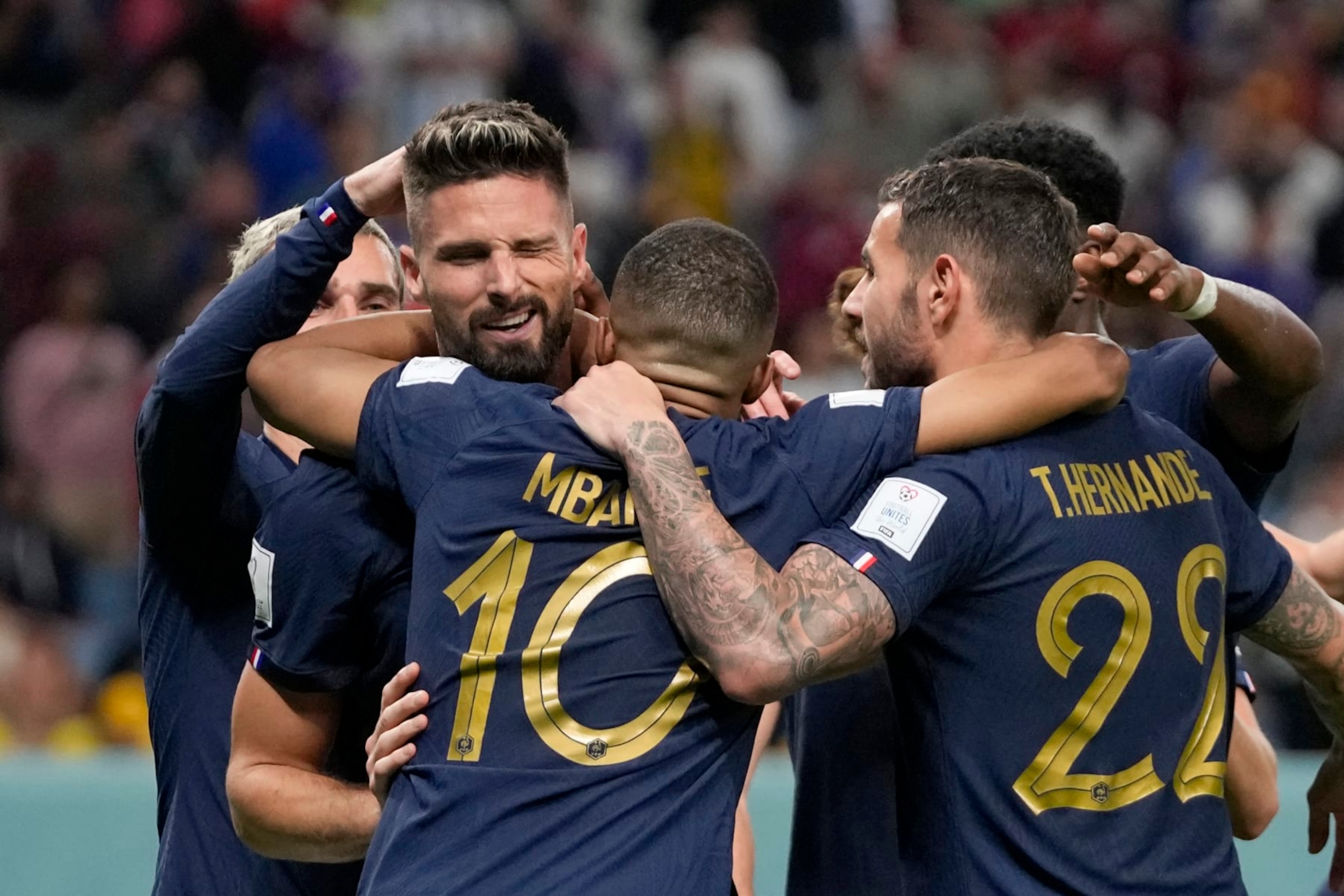 France's Olivier Giroud, 2nd left, celebrates after scoring his side's fourth goal during the World Cup group D soccer match between France and Australia, at the Al Janoub Stadium in Al Wakrah, Qatar, Tuesday, Nov. 22, 2022. (AP Photo/Thanassis Stavrakis)