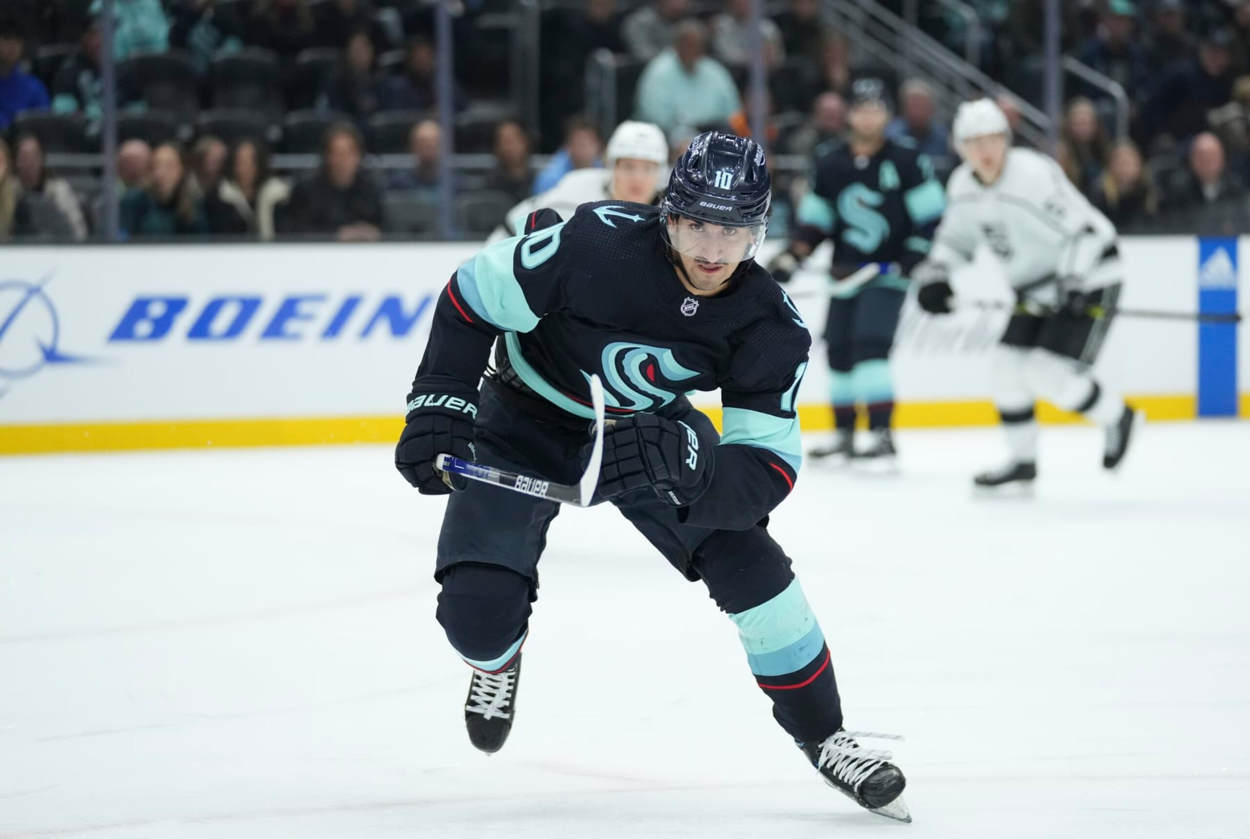 SEATTLE, WA - NOVEMBER 19: Seattle Kraken center Matty Beniers (10) skates after the puck during an NHL game between the LA Kings and the Seattle Kraken on November 19, 2022 at Climate Pledge Arena in Seattle, WA. (Photo by Jeff Halstead/Icon Sportswire via Getty Images)