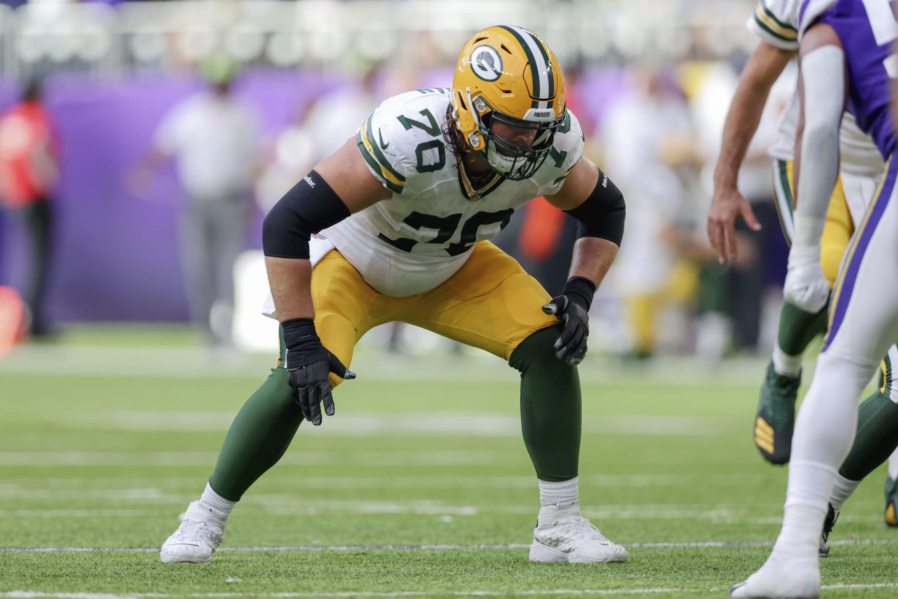 Green Bay Packers offensive tackle Royce Newman (70) in action during the second half of an NFL football game against the Minnesota Vikings, Sunday, Sept. 11, 2022 in Minneapolis. (AP Photo/Stacy Bengs)
