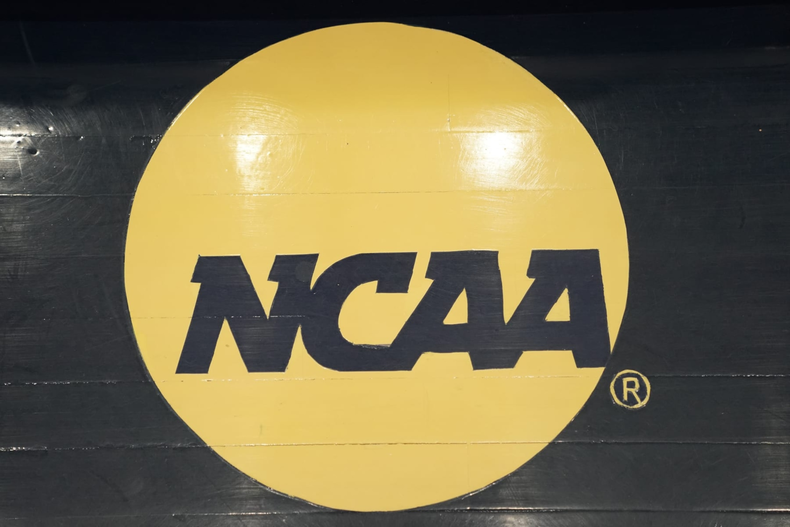 WASHINGTON, DC, MD - OCTOBER 30: The NCAA logo on the floor before an exhibition college basketball game between the George Washington Colonials and the Western Connecticut State Wolves the Smith Center on October 30, 2022 in Washington, DC. (Photo by Mitchell Layton/Getty Images) WASHINGTON, DC, MD - OCTOBER 30: The NCAA logo on the floor before an exhibition college basketball game between the George Washington Colonials and the Western Connecticut State Wolves the Smith Center on October 30, 2022 in Washington, DC. (Photo by Mitchell Layton/Getty Images)