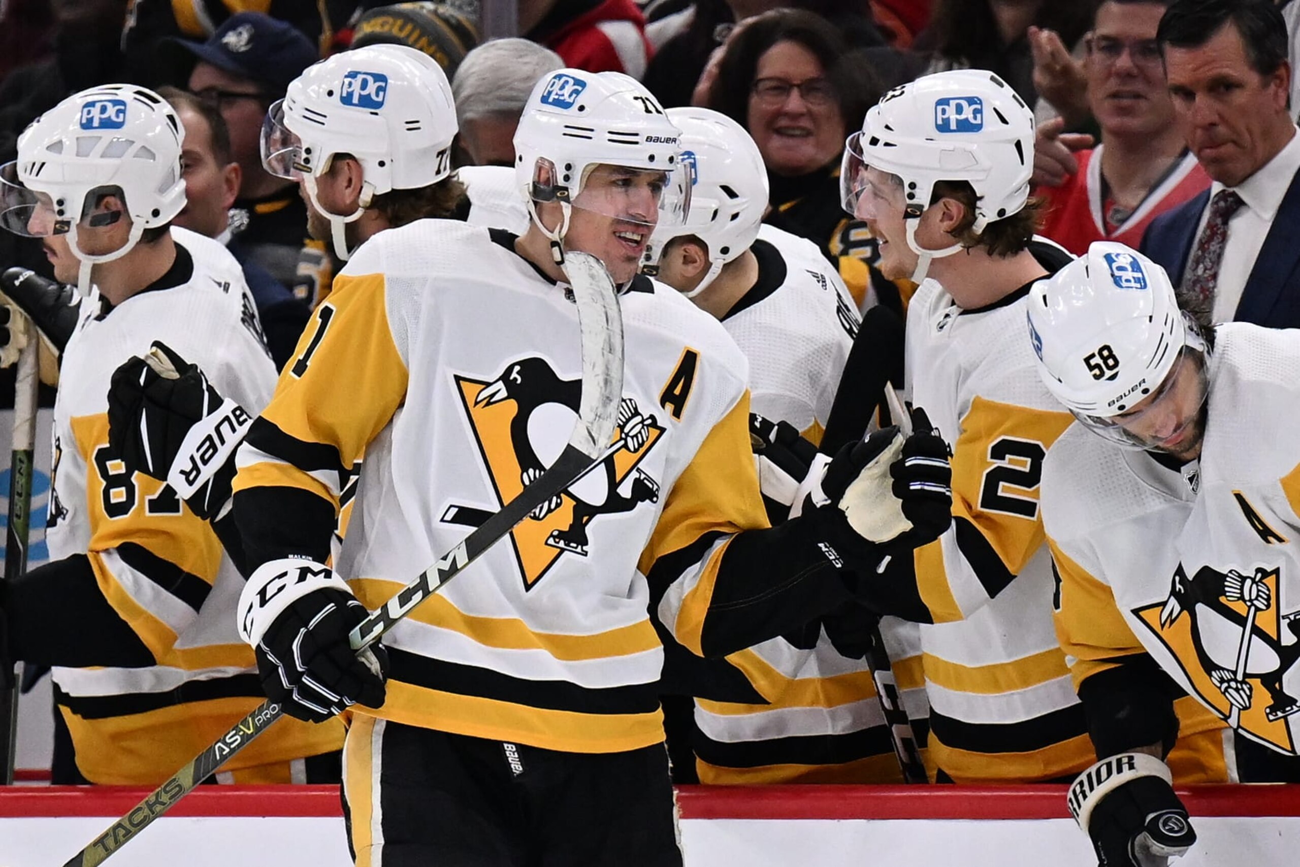 CHICAGO, ILLINOIS - NOVEMBER 20: Evgeni Malkin #71 of the Pittsburgh Penguins celebrates with the bench after scoring a second period goal while playing in his 1000th NHL game against the Chicago Blackhawks on November 20, 2022 at United Center in Chicago, Illinois. (Photo by Jamie Sabau/Getty Images) CHICAGO, ILLINOIS - NOVEMBER 20: Evgeni Malkin #71 of the Pittsburgh Penguins celebrates with the bench after scoring a second period goal while playing in his 1000th NHL game against the Chicago Blackhawks on November 20, 2022 at United Center in Chicago, Illinois. (Photo by Jamie Sabau/Getty Images)