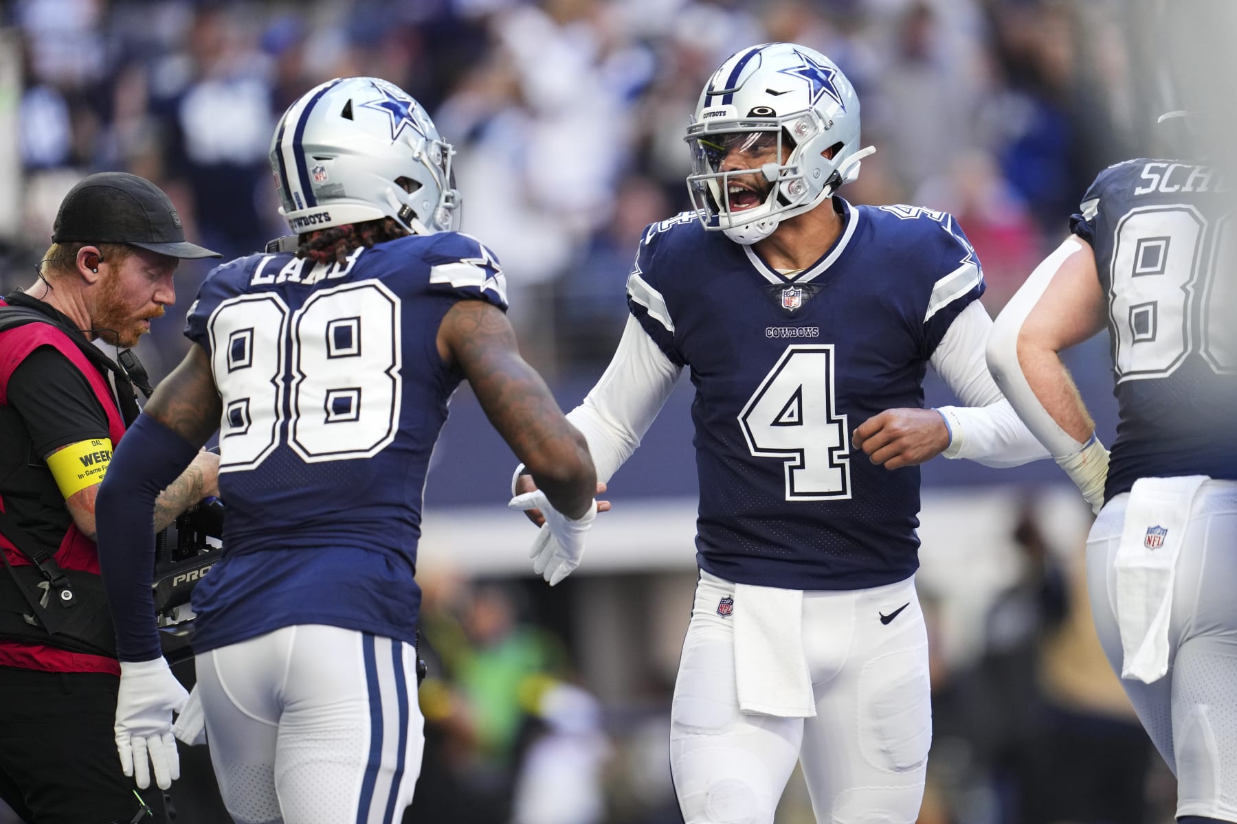 ARLINGTON, TX - OCTOBER 30: Dak Prescott #4 of the Dallas Cowboys celebrates with CeeDee Lamb #88 against the Chicago Bears at AT&T Stadium on October 30, 2022 in Arlington, Texas. (Photo by Cooper Neill/Getty Images)