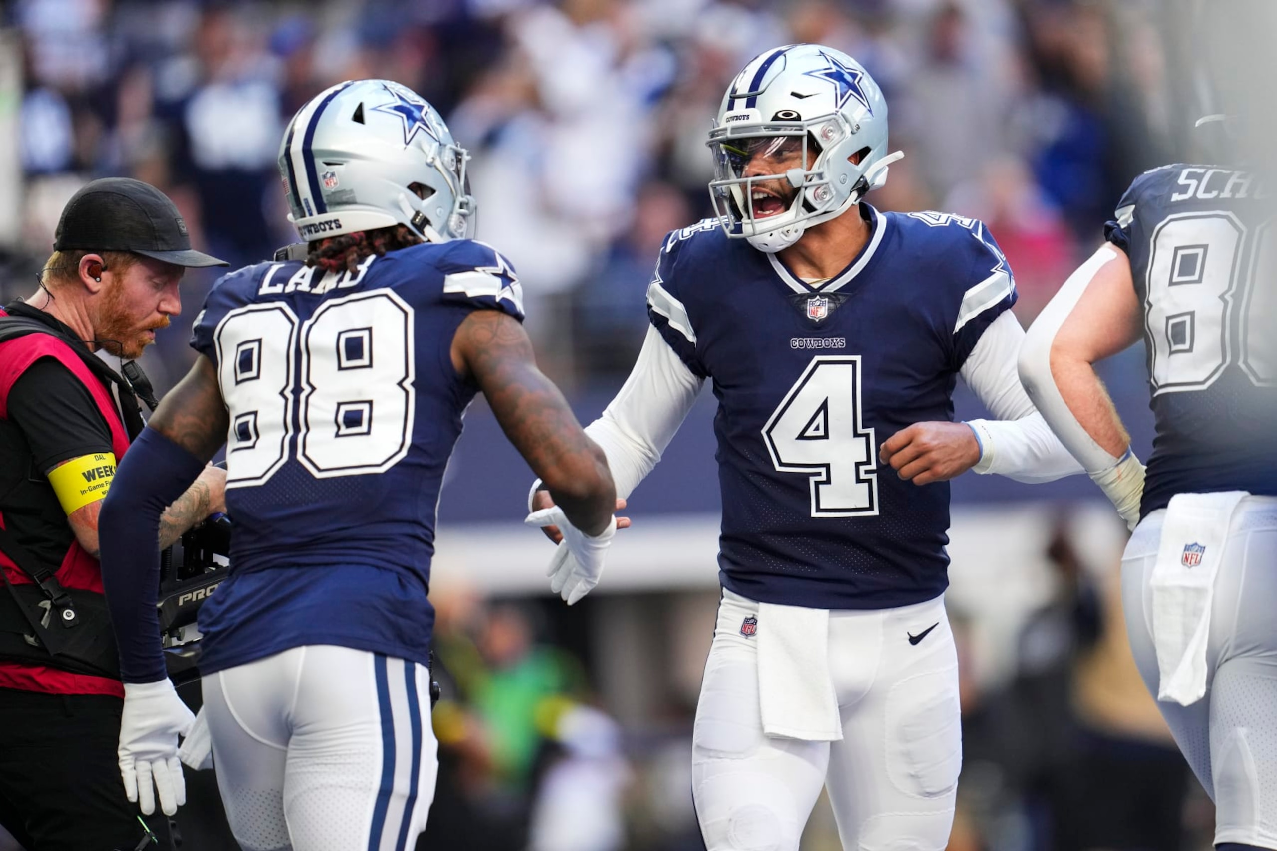 ARLINGTON, TX - OCTOBER 30: Dak Prescott #4 of the Dallas Cowboys celebrates with CeeDee Lamb #88 against the Chicago Bears at AT&T Stadium on October 30, 2022 in Arlington, Texas. (Photo by Cooper Neill/Getty Images) ARLINGTON, TX - OCTOBER 30: Dak Prescott #4 of the Dallas Cowboys celebrates with CeeDee Lamb #88 against the Chicago Bears at AT&T Stadium on October 30, 2022 in Arlington, Texas. (Photo by Cooper Neill/Getty Images)