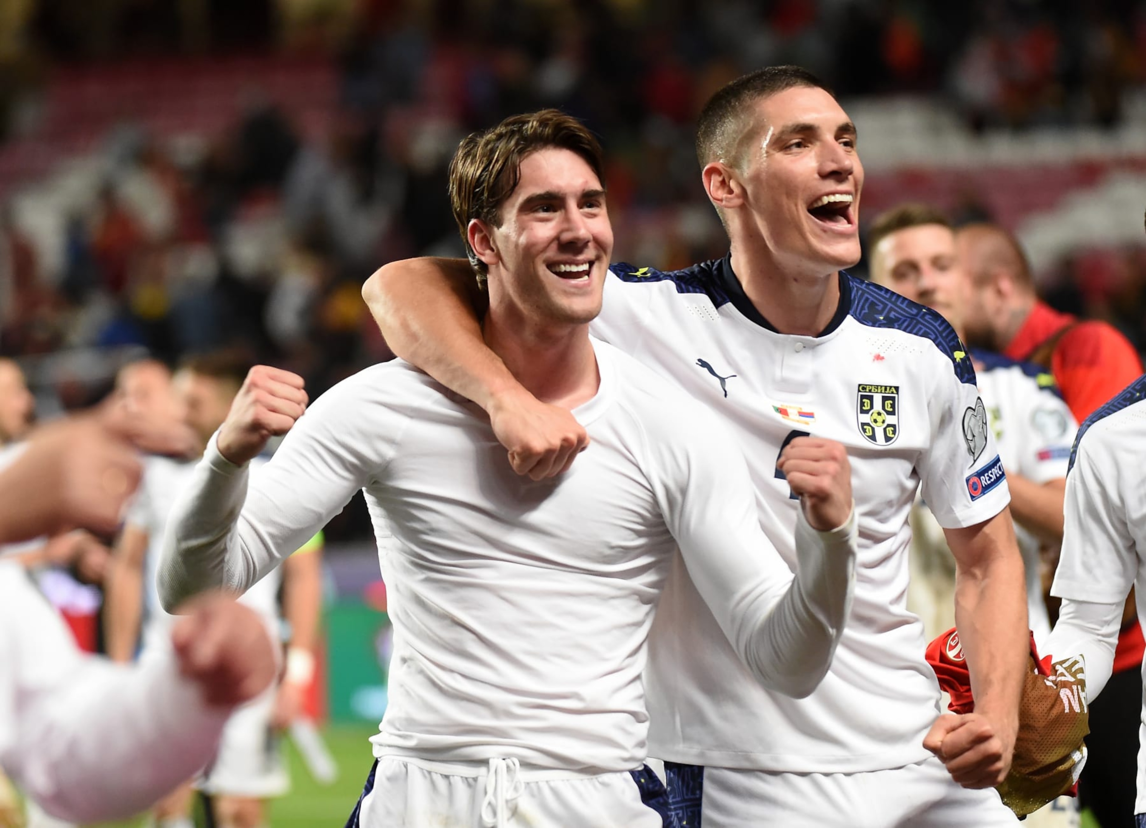 LISBON, PORTUGAL - NOVEMBER 14: Dusan Vlahovic and Nikola MilenkoviÄ of Serbia celebrate after winning the match at the 2022 FIFA World Cup Qualifier match between Portugal and Serbia at Estadio Jose Alvalade on November 14, 2021 in Lisbon, Lisboa. (Photo by Zed Jameson/MB Media/Getty Images)